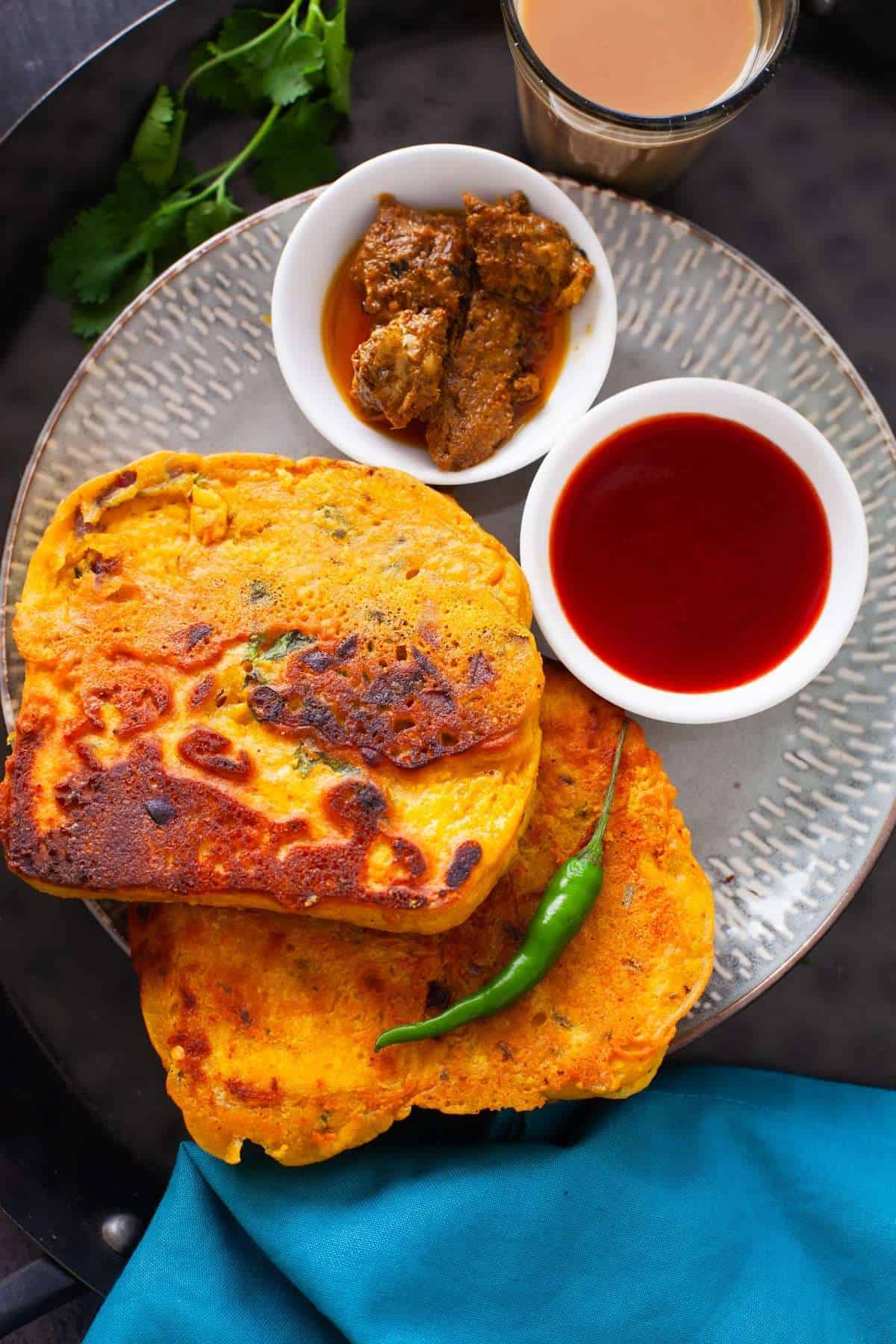 Besan bread toast with pickle and chilli sauce.