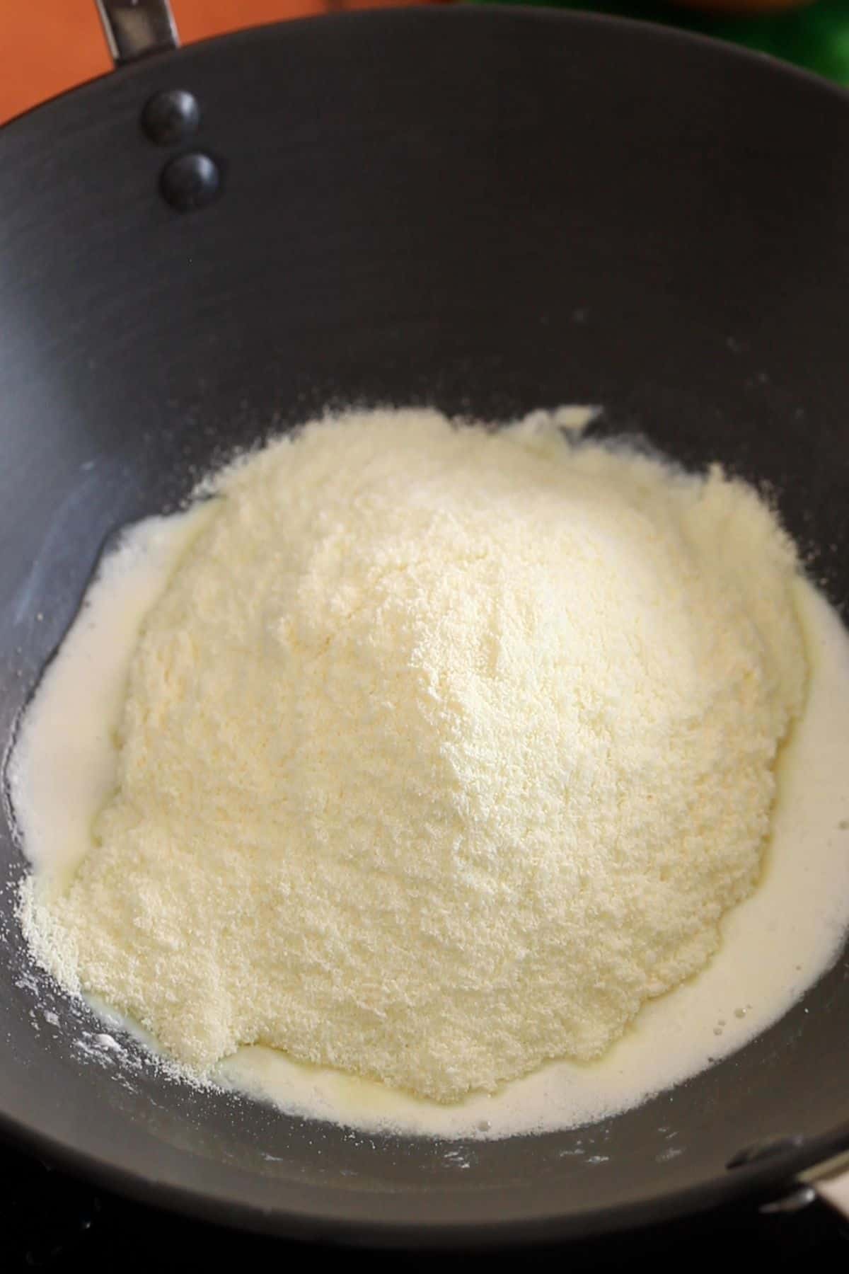 Milk powder is added to curdled milk. 