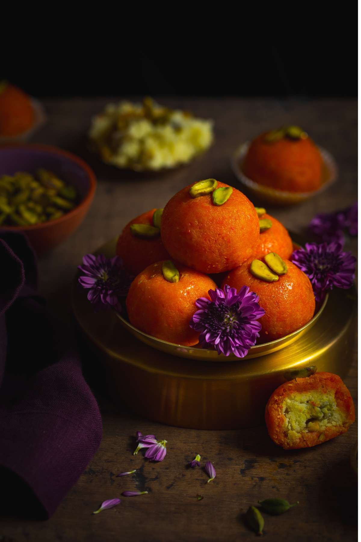 Side view of a stack of carrot ladoo.