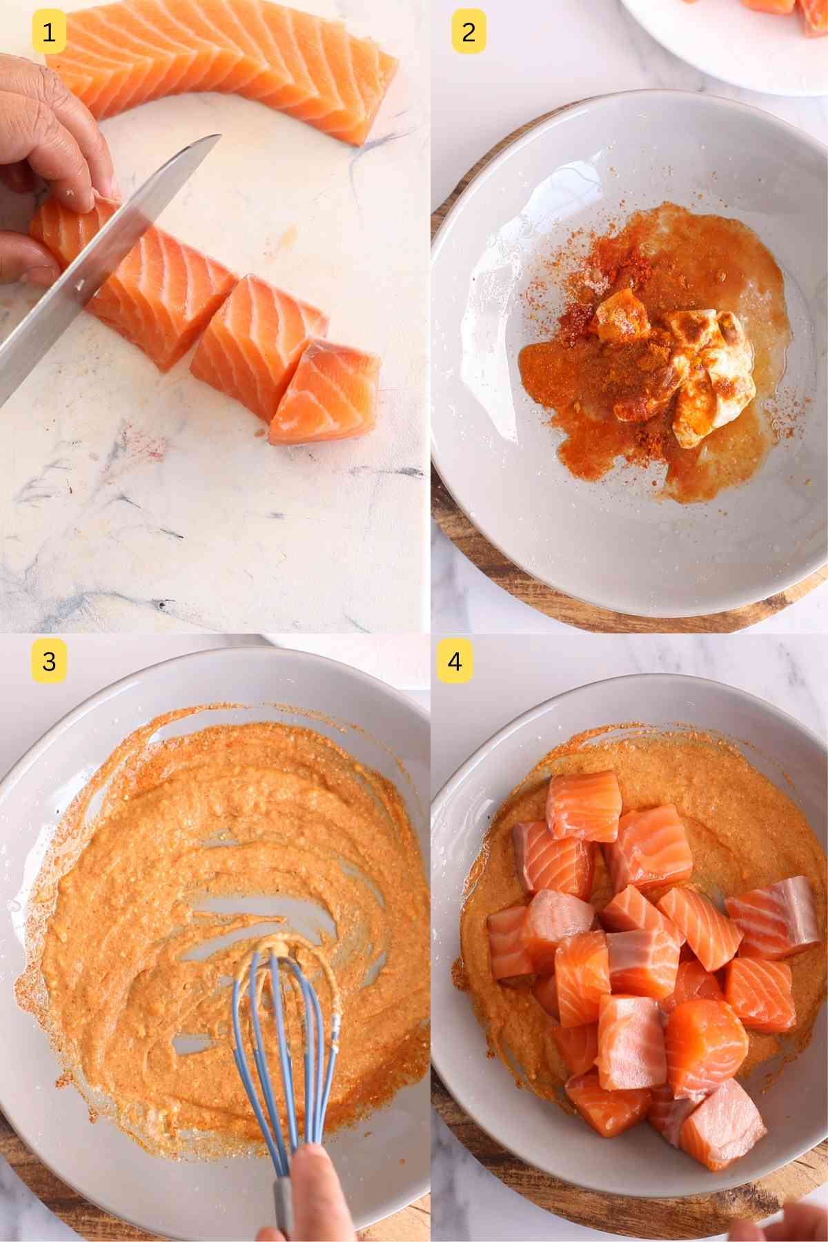 Marinating salmon in tandoori marinade.