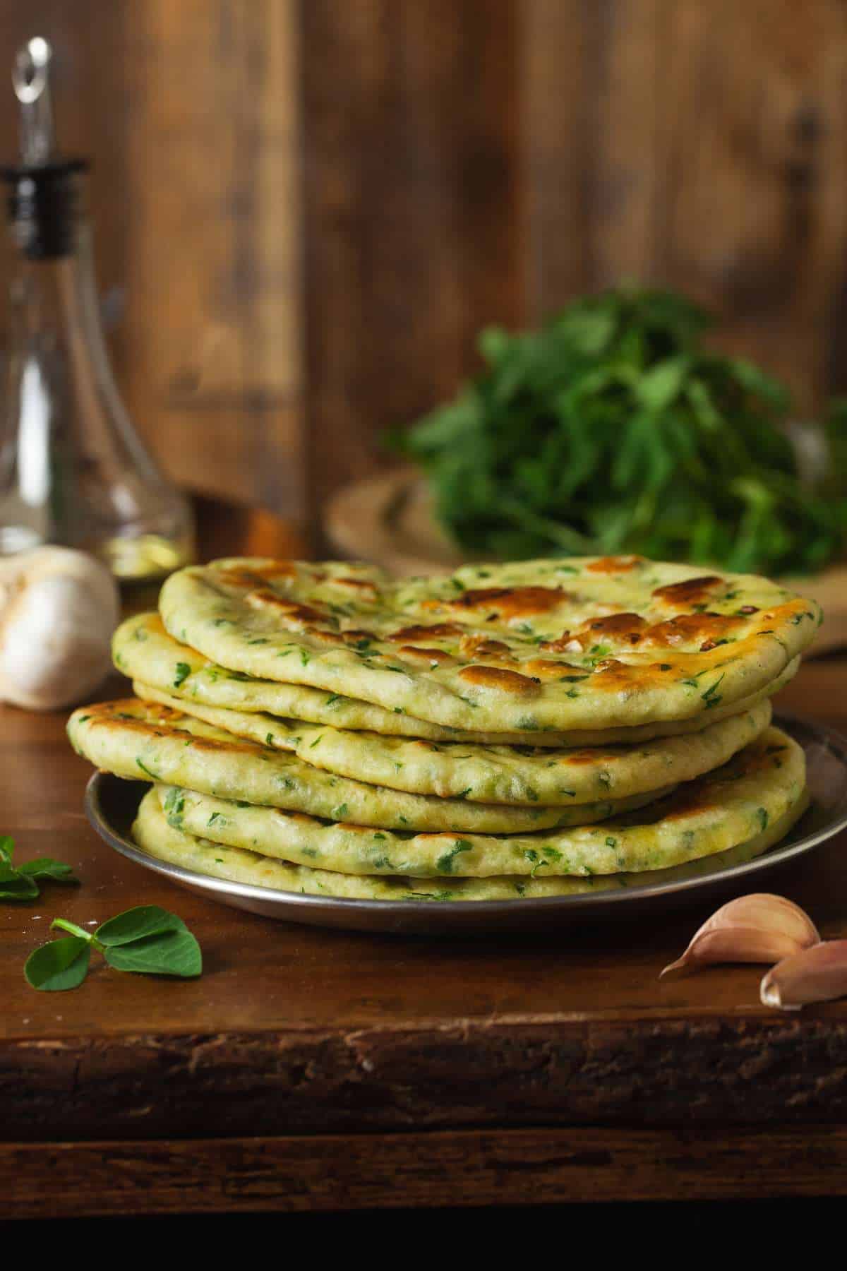 Stack of naan made without yeast.