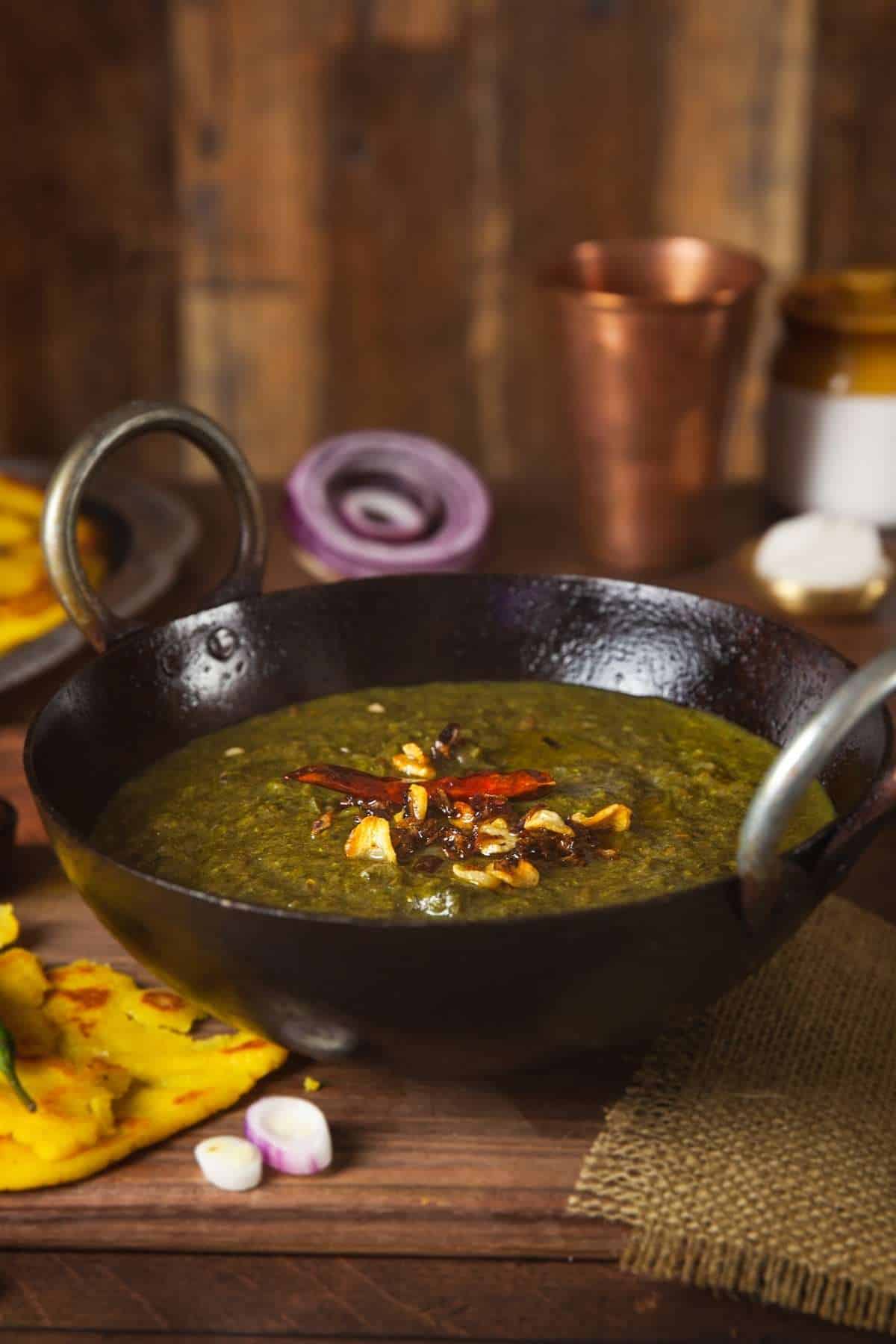 Side view of Indian mustard greens curry.