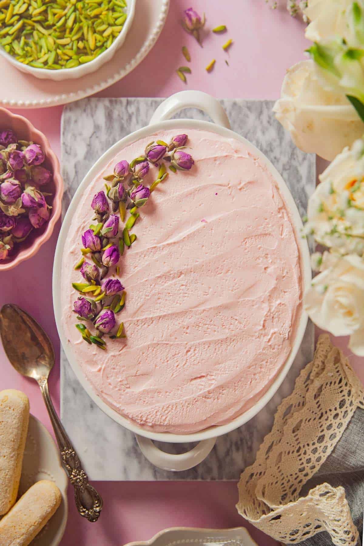 A dish containing layered Egg free Rose Tiramisu 