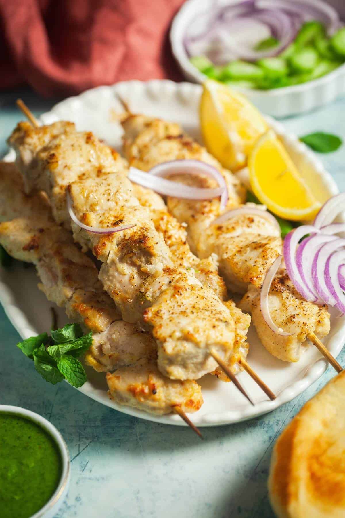 Side shot of the chicken malai tikka platter