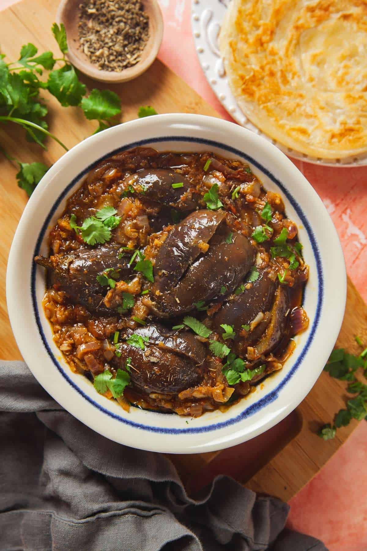 Bharwa Baigan - Stuffed Baby Eggplant in a bowl