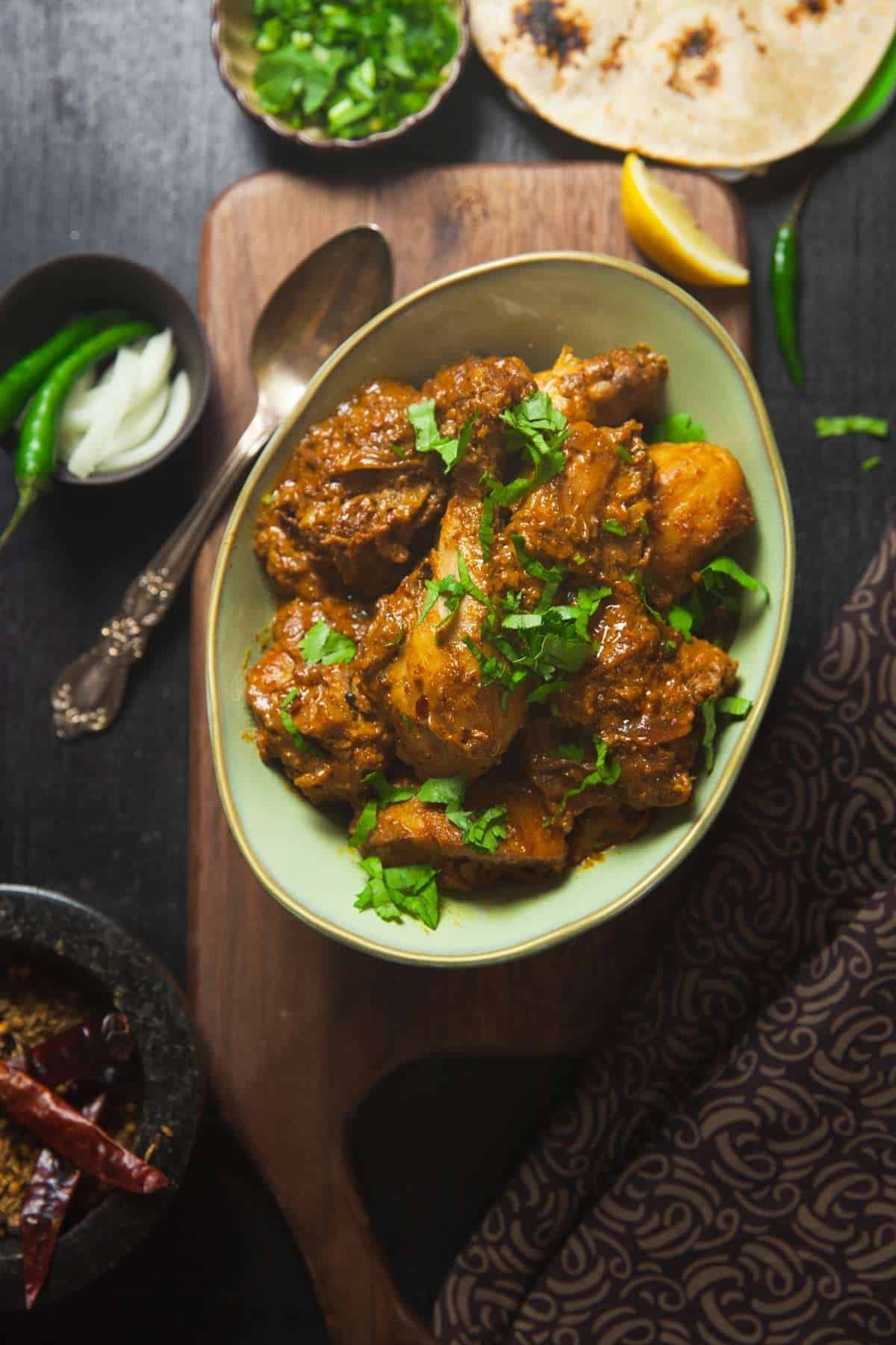 Dahi Chicken in a Sage Colored bowl