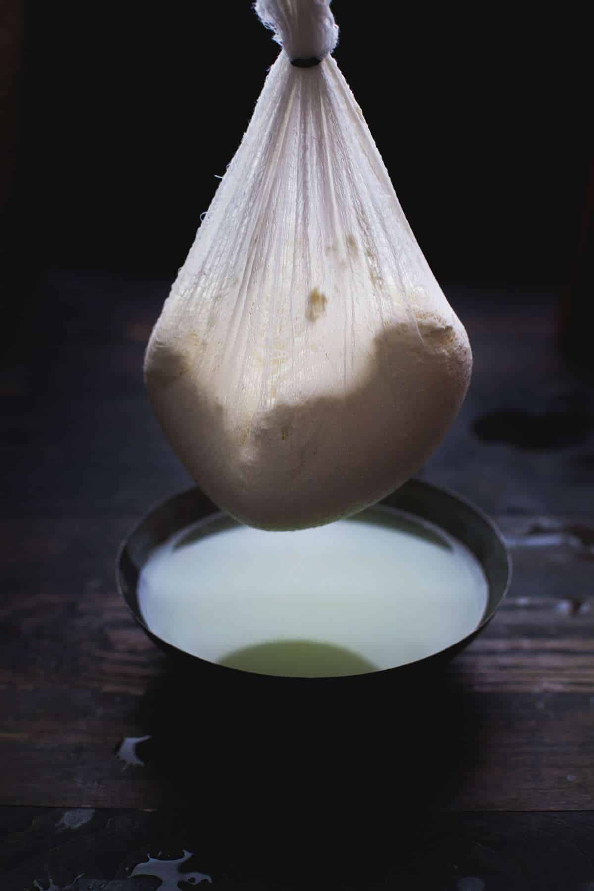 Whey draining from paneer