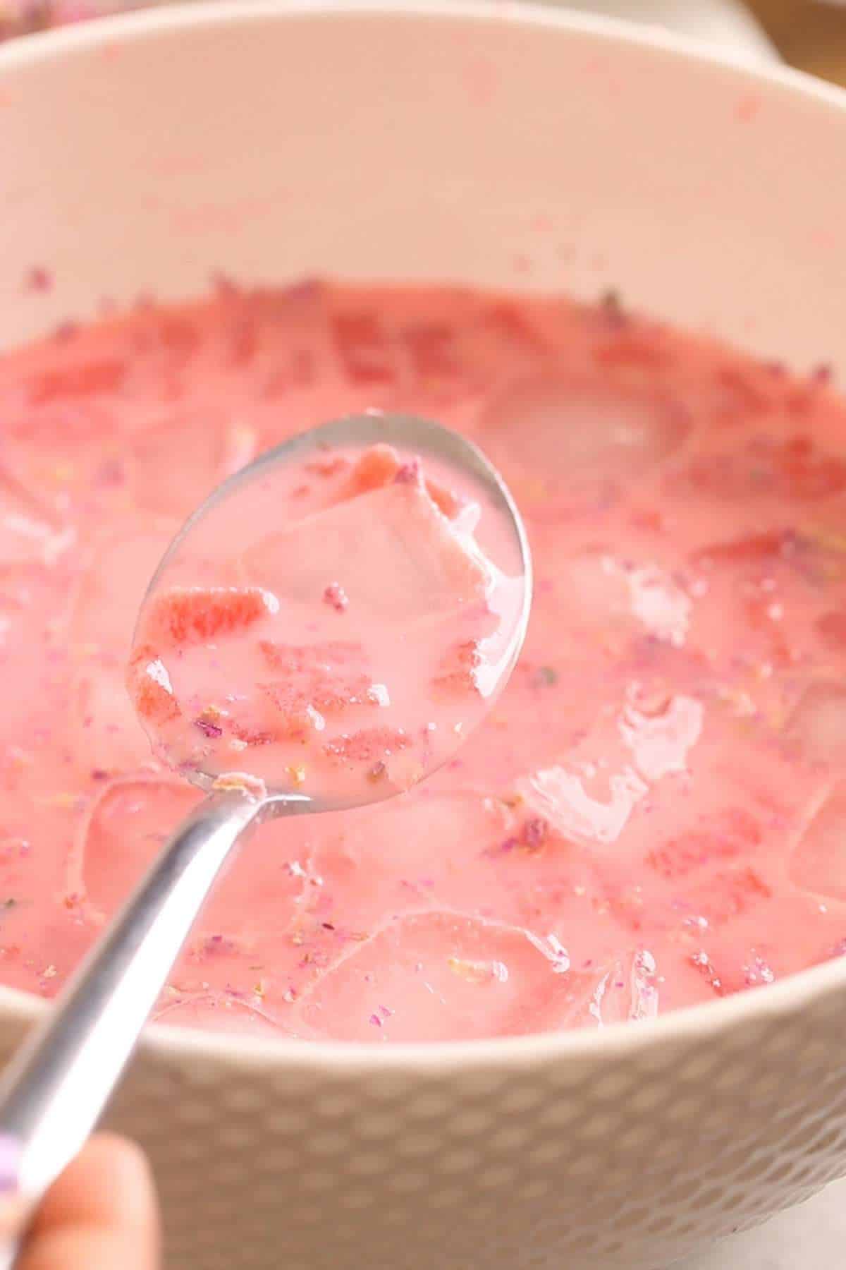Watermelon rose and milk Sharbat with ice cubes.