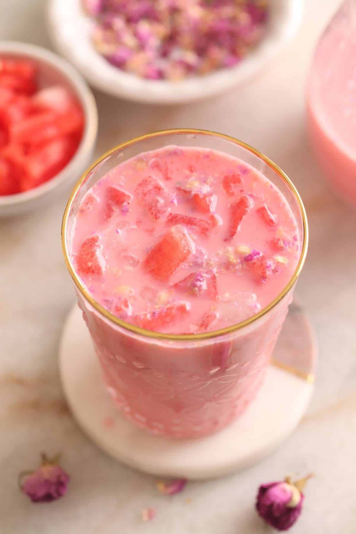 Sharbad ready to serve in a gold rimmed glass.