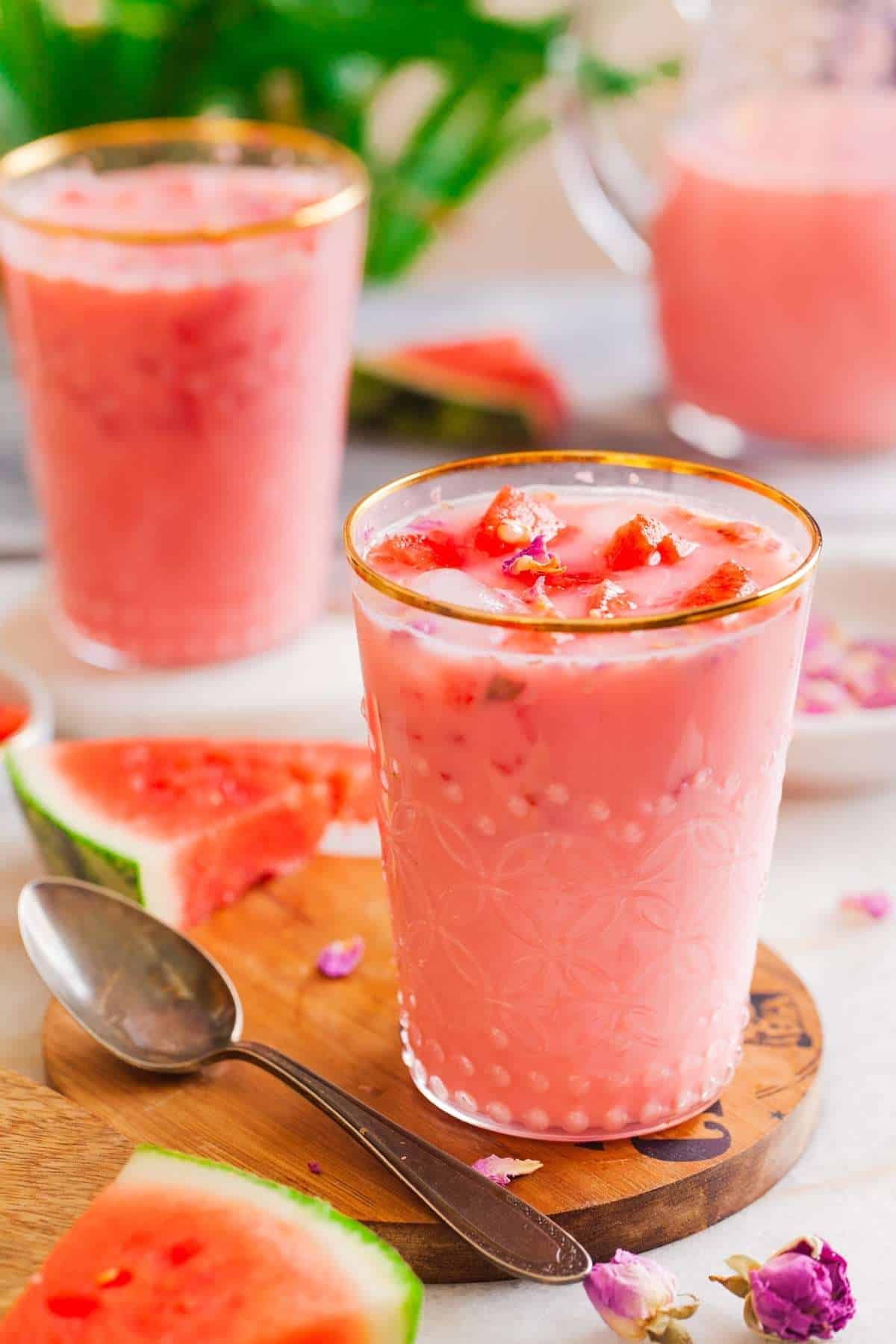 Mohabbat Ka Sharbat in a gold rimmed glass on marble background.