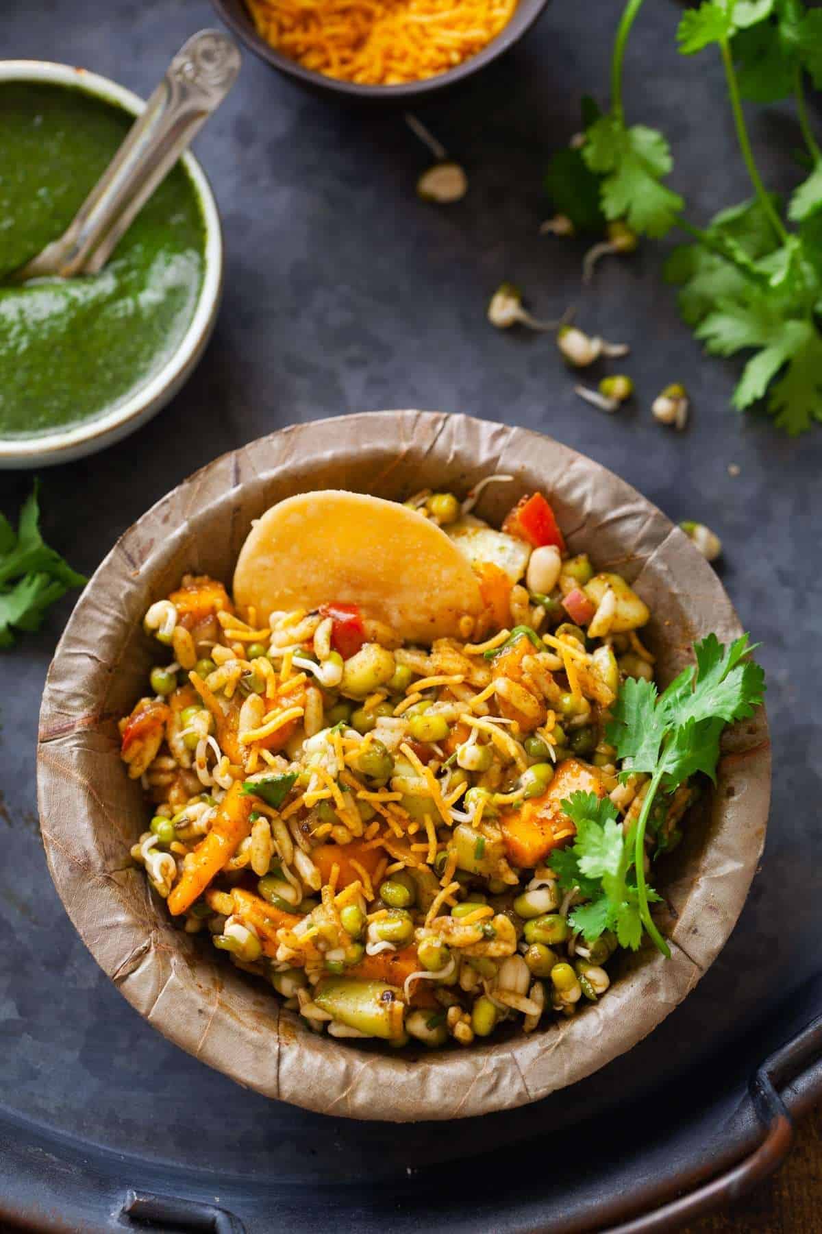 Moong Sprout Bhel in a bowl made with leaves.