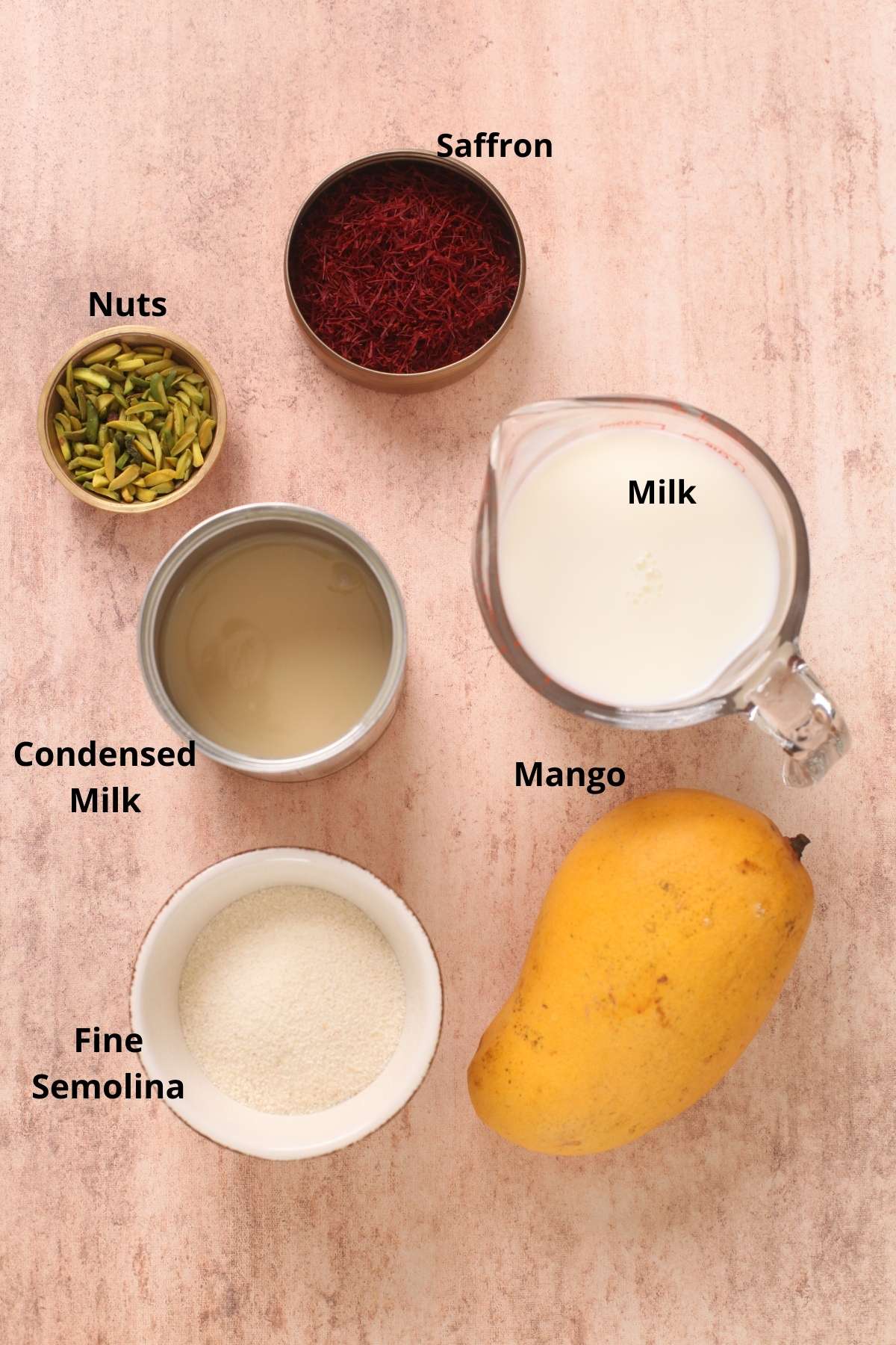 Ingredients to make indian mango semolina pudding.