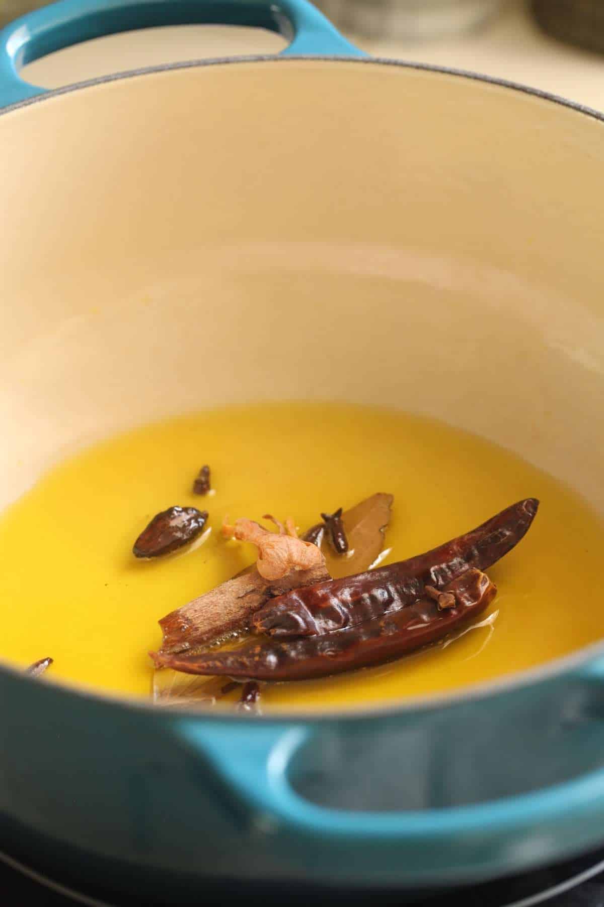 Whole spices in oil.