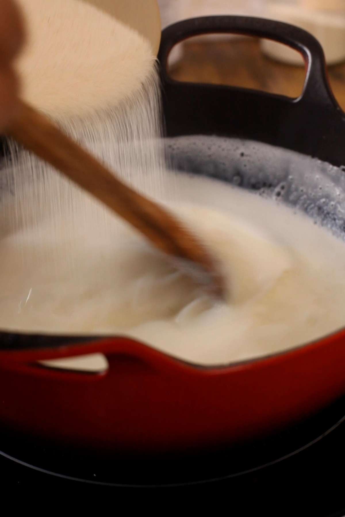 Add semolina to milk. 