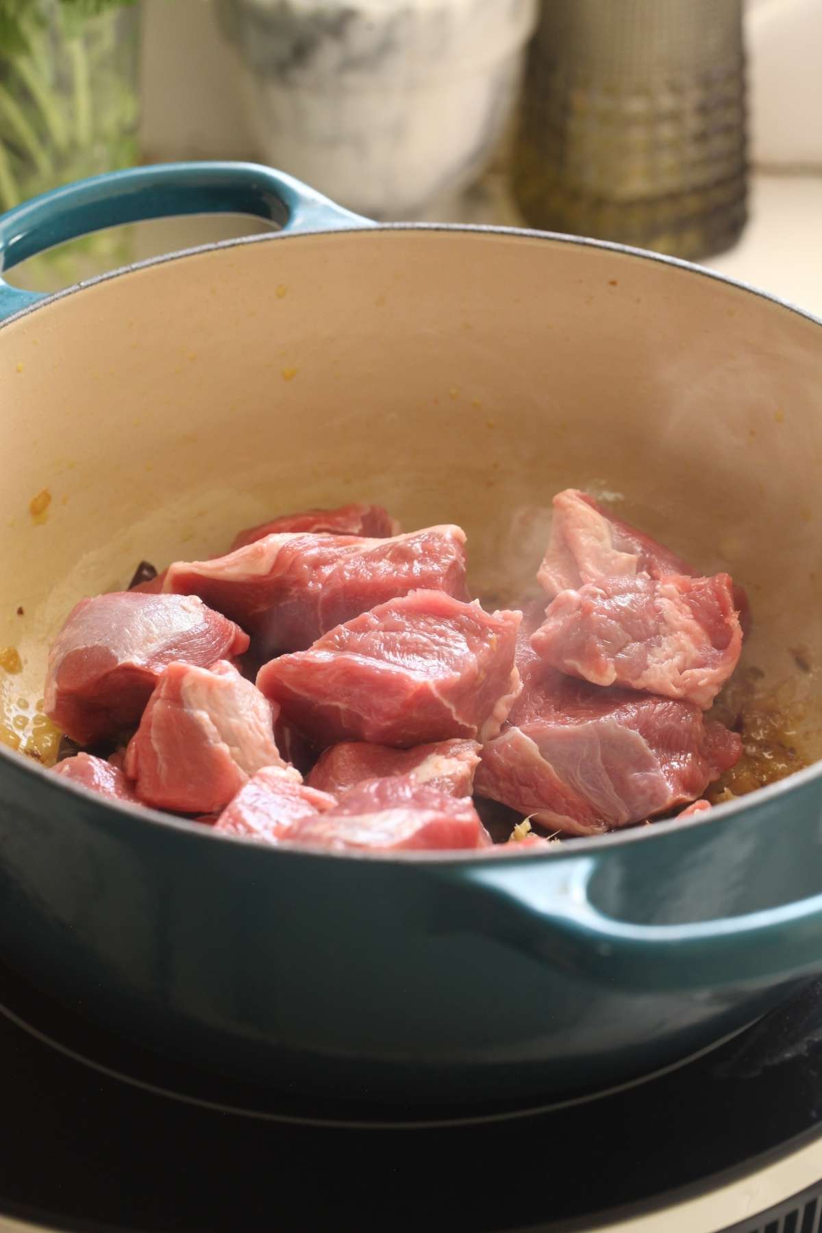 Lamb chunks added to browned onion.