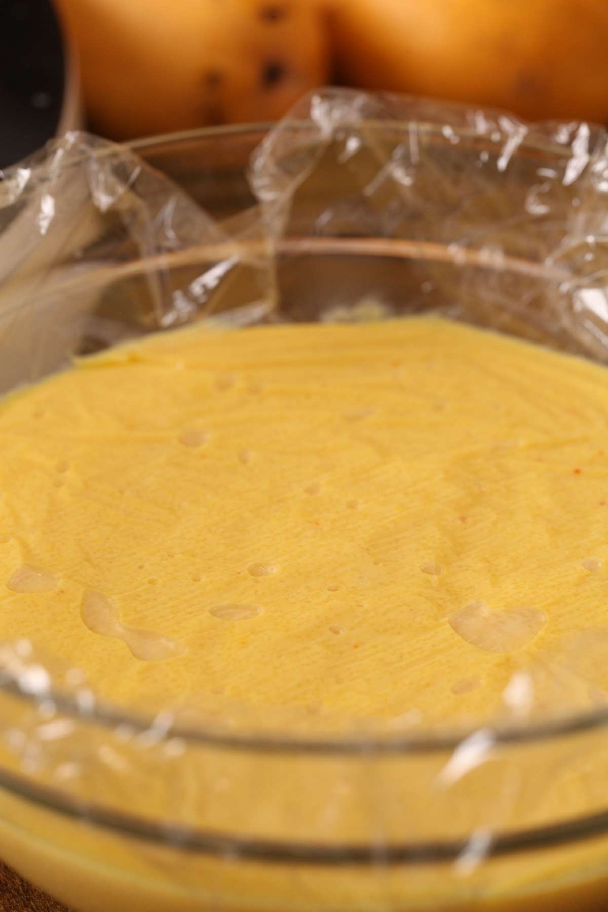 Cool phirni by covering it with cling bowl and refrigerating. 