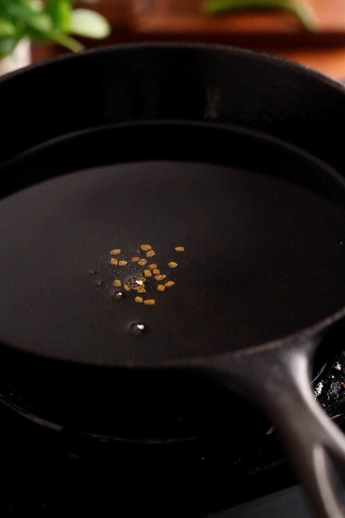 Mustard oil is tempered with fenugreek to flavor the oil. 