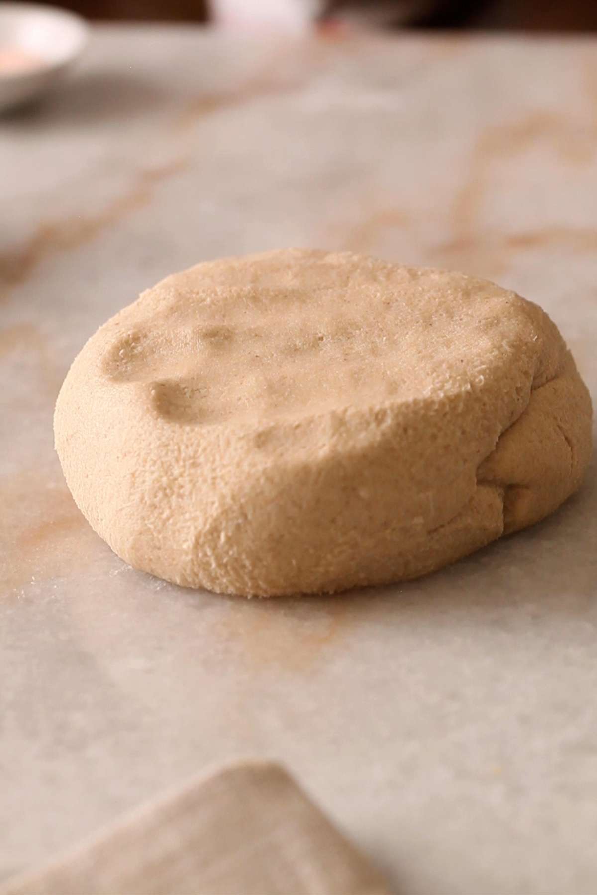 Knead the dough after resting to a smooth ball. 