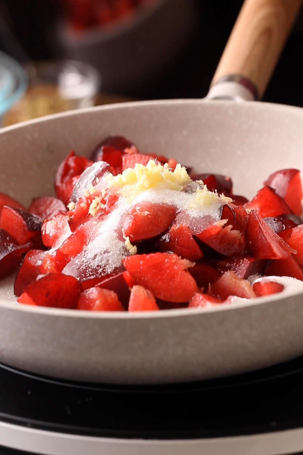 Chopped Plums, Ginger, Salit & Sugar In a Pan for making plum filling. 
