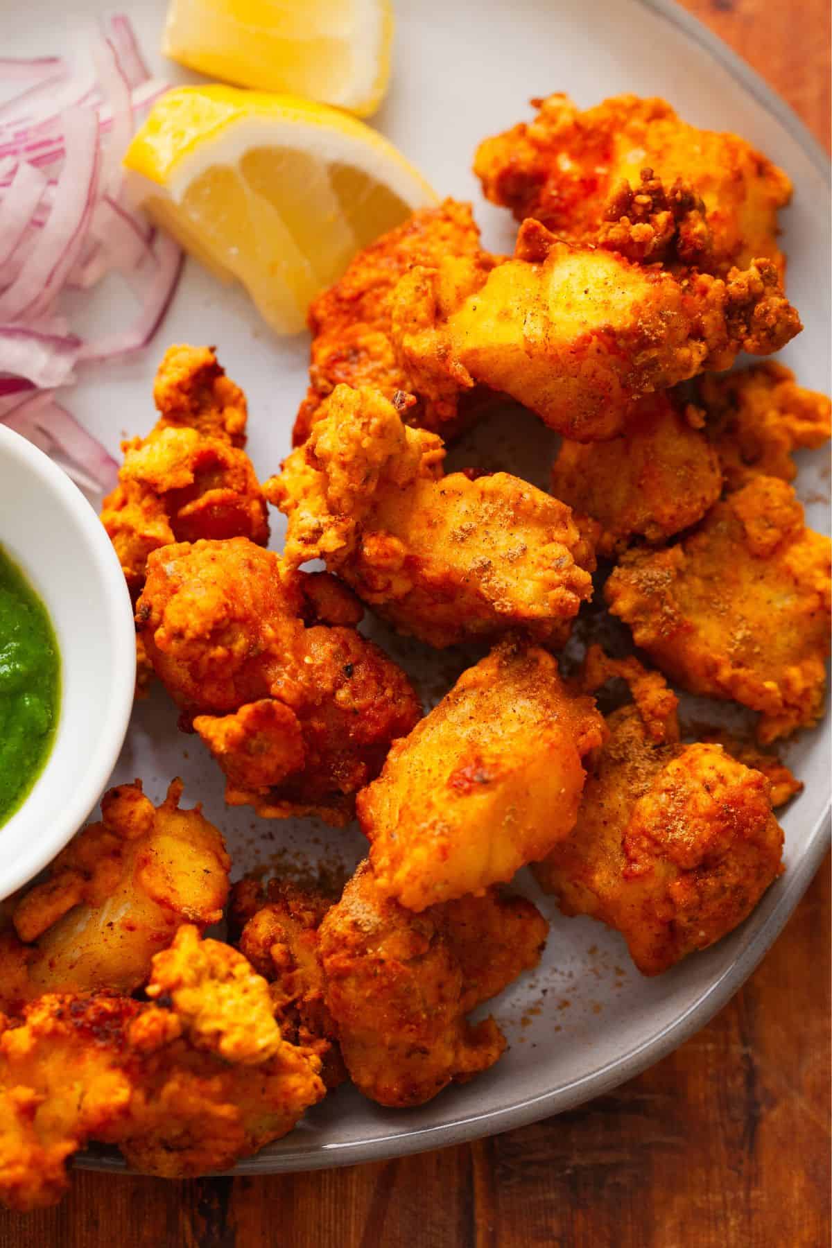 Closeup of amrtisari fish pakora. 