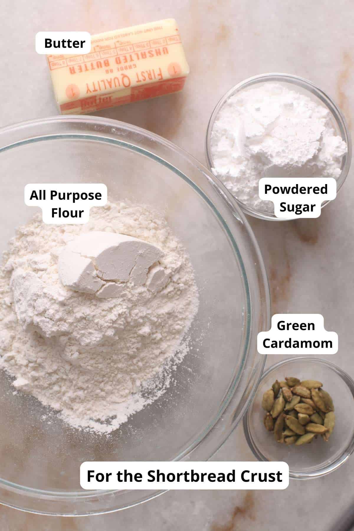 Shortbread Crust Ingredients on a marble board