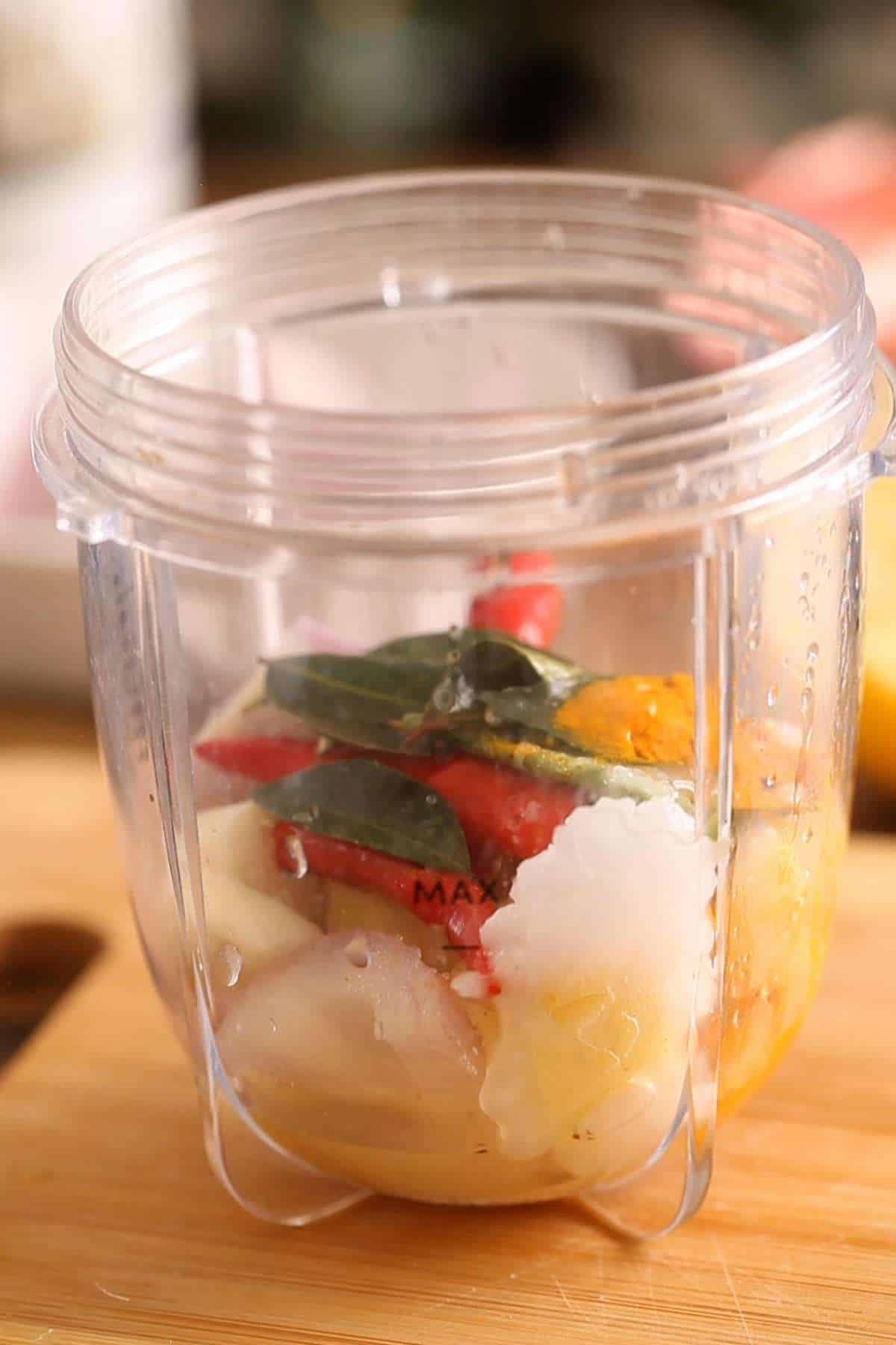 Ingredients added to a small blender jar to make masala(spice paste) for the salmon.