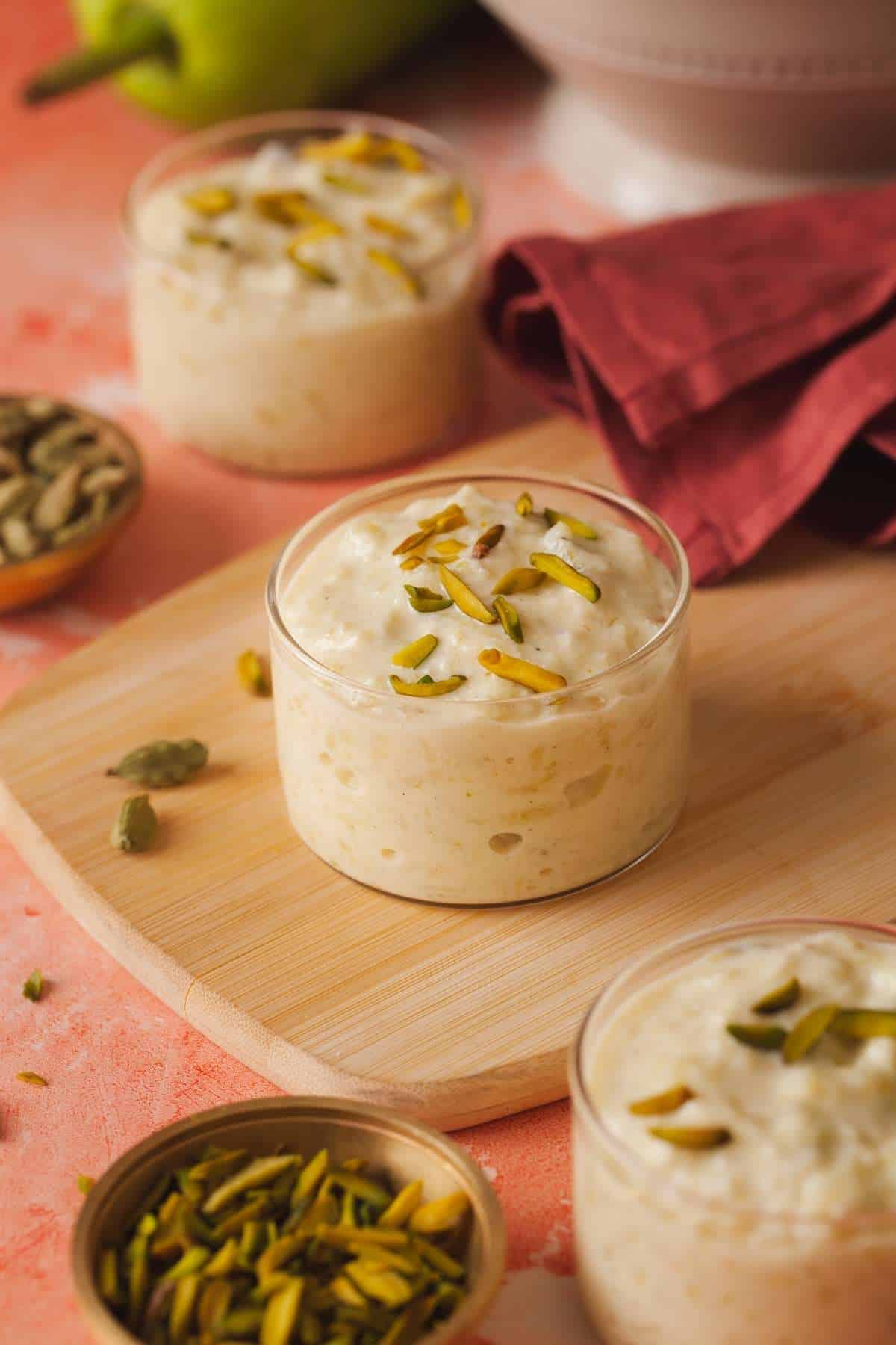 Lauki Ki Kheer or Bottle Gourd Pudding in a glass bowl with nuts.