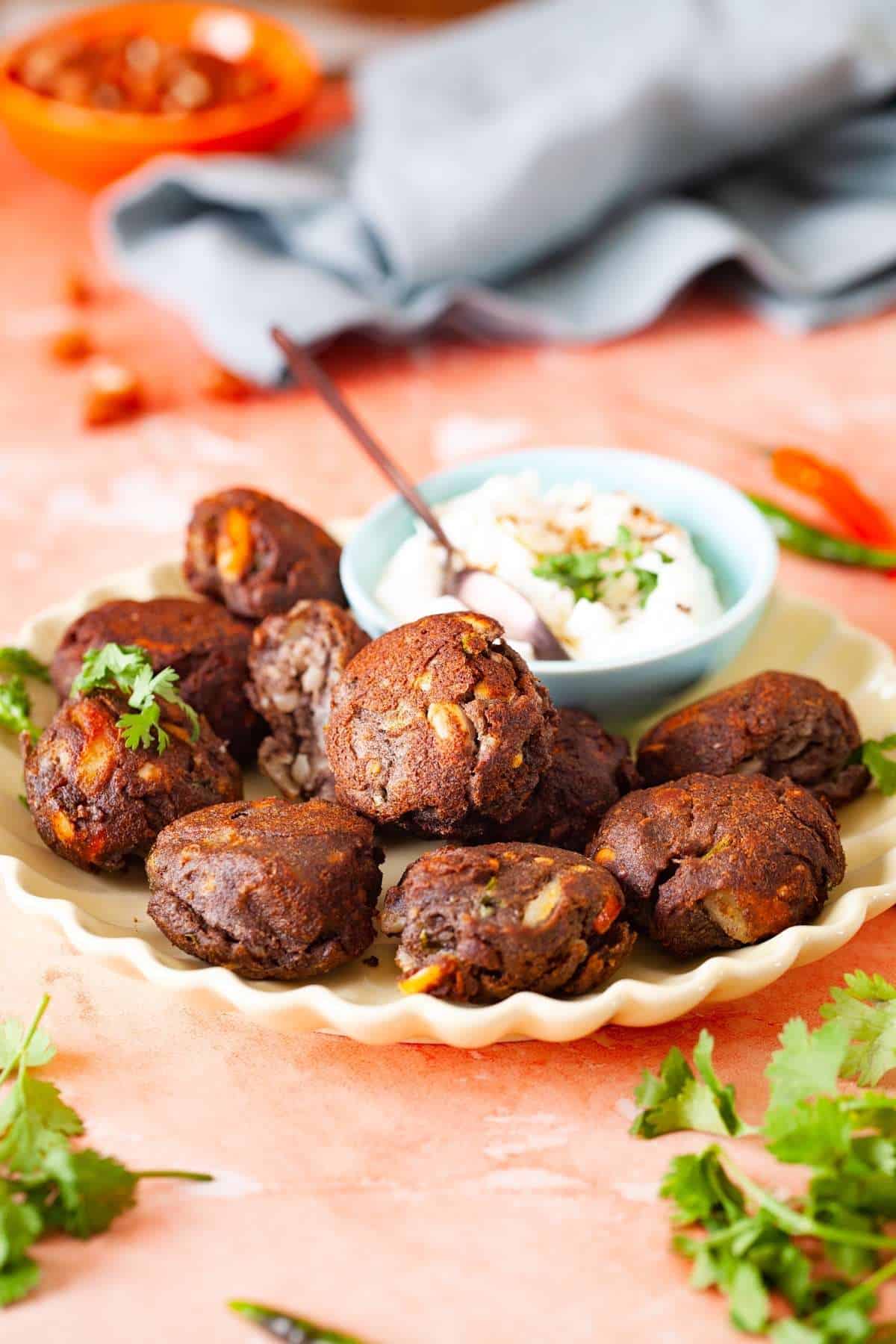 Side shot of savory buckwheat fritters.