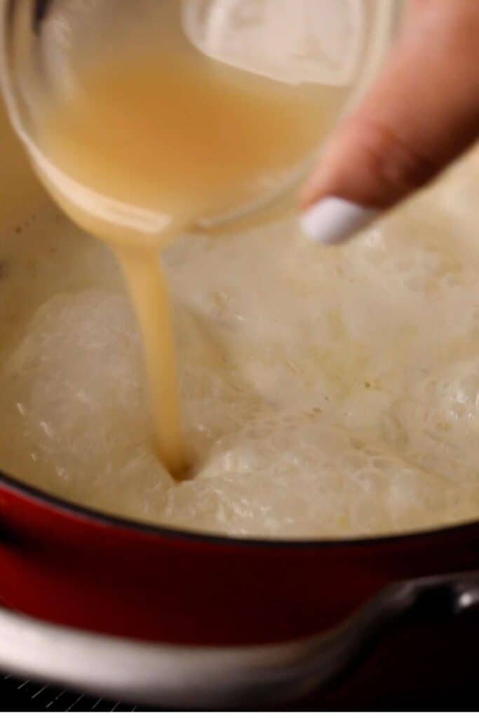 Condensed Coconut Milk being added to lauki kheer.