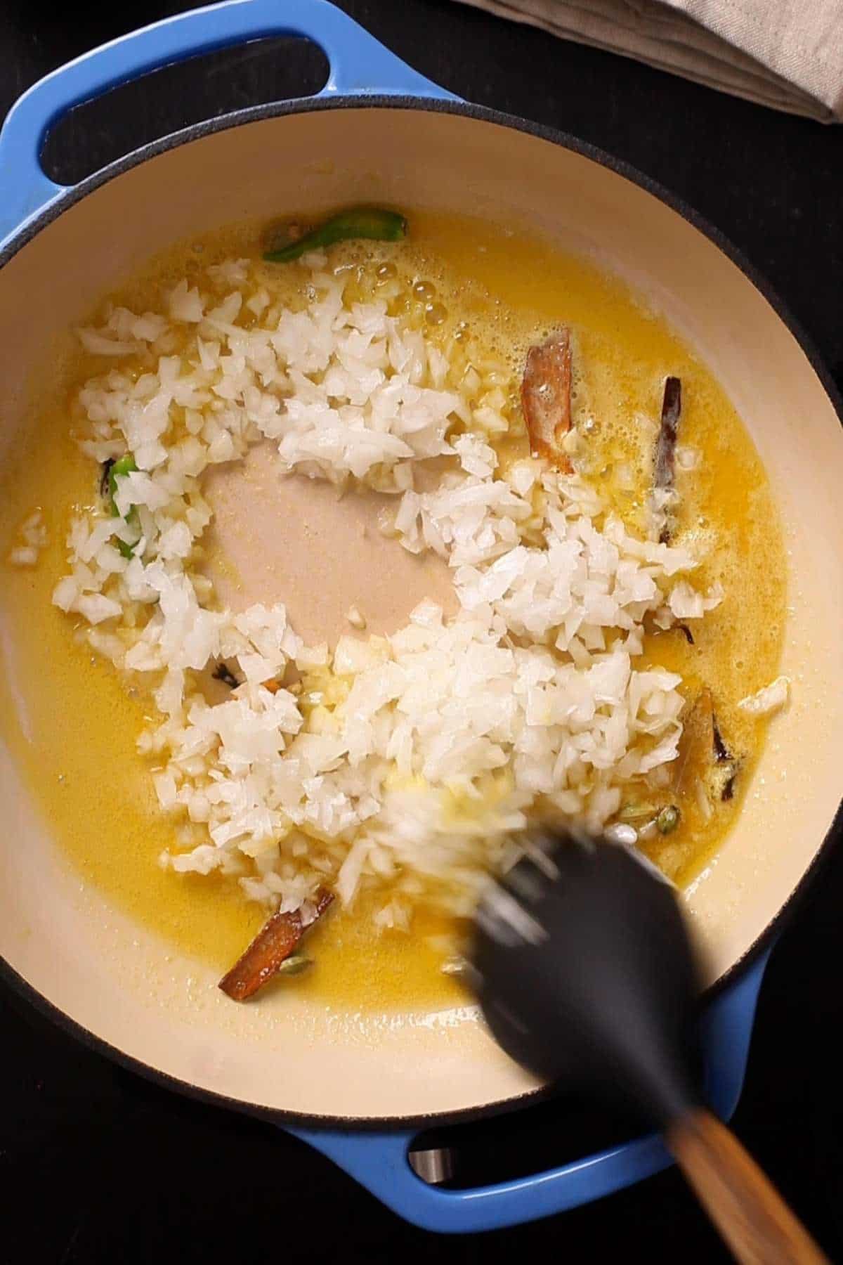 Browning chopped onions.