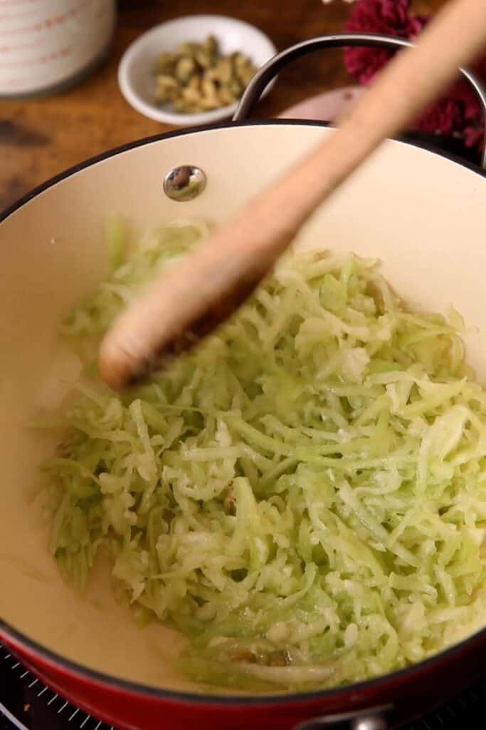 Sauteeing lauki in ghee.