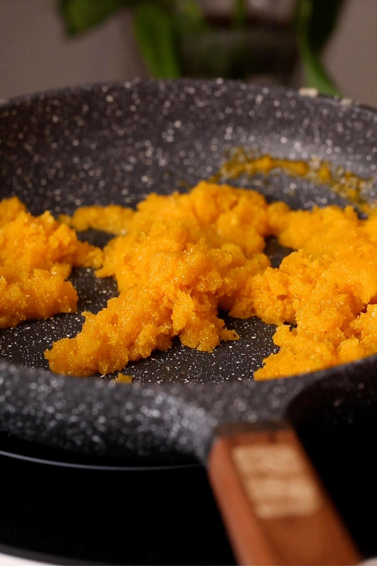 Semolina absorbs mango pulp.