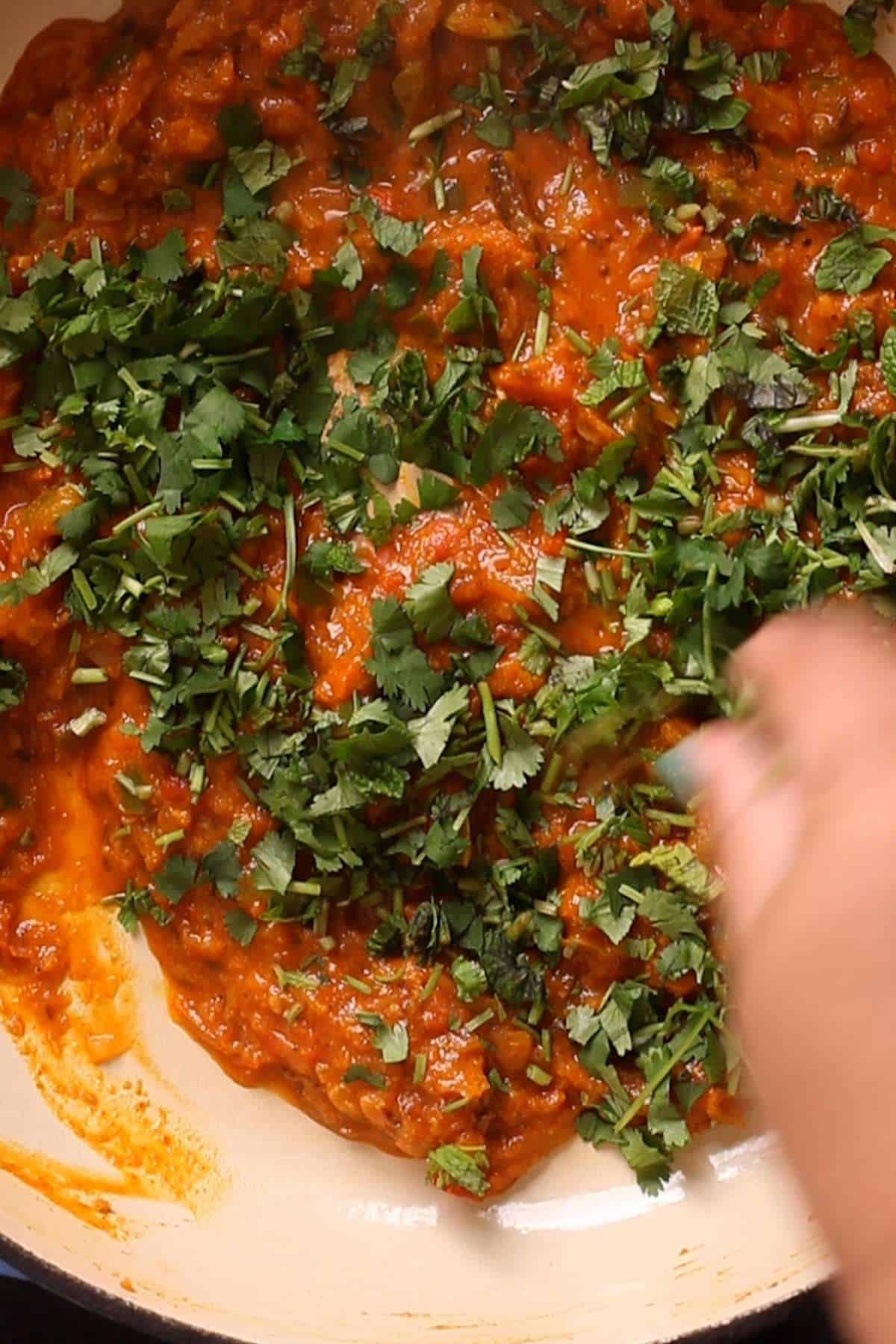 Fresh herbs like cilantro & mint added to the masala. 
