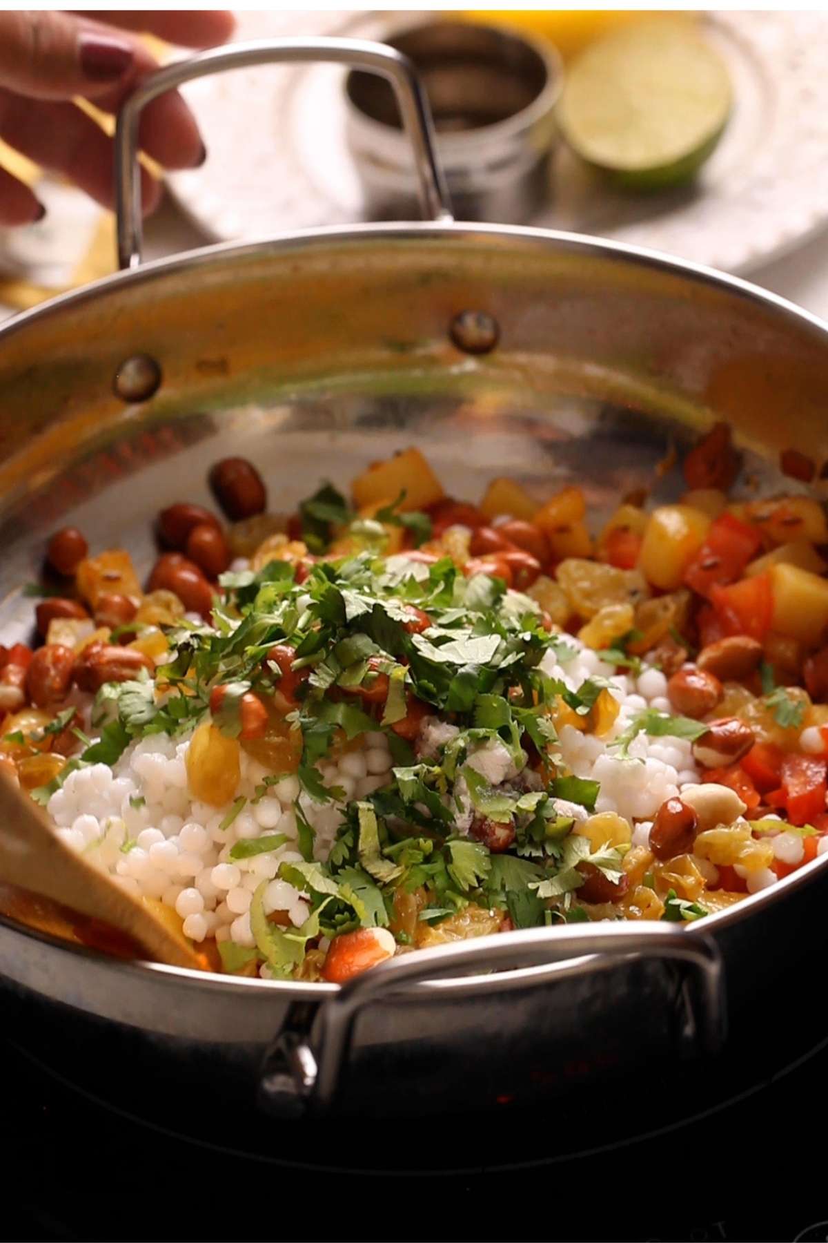 Add soaked sabudana, salt and peanuts to make khichdi.