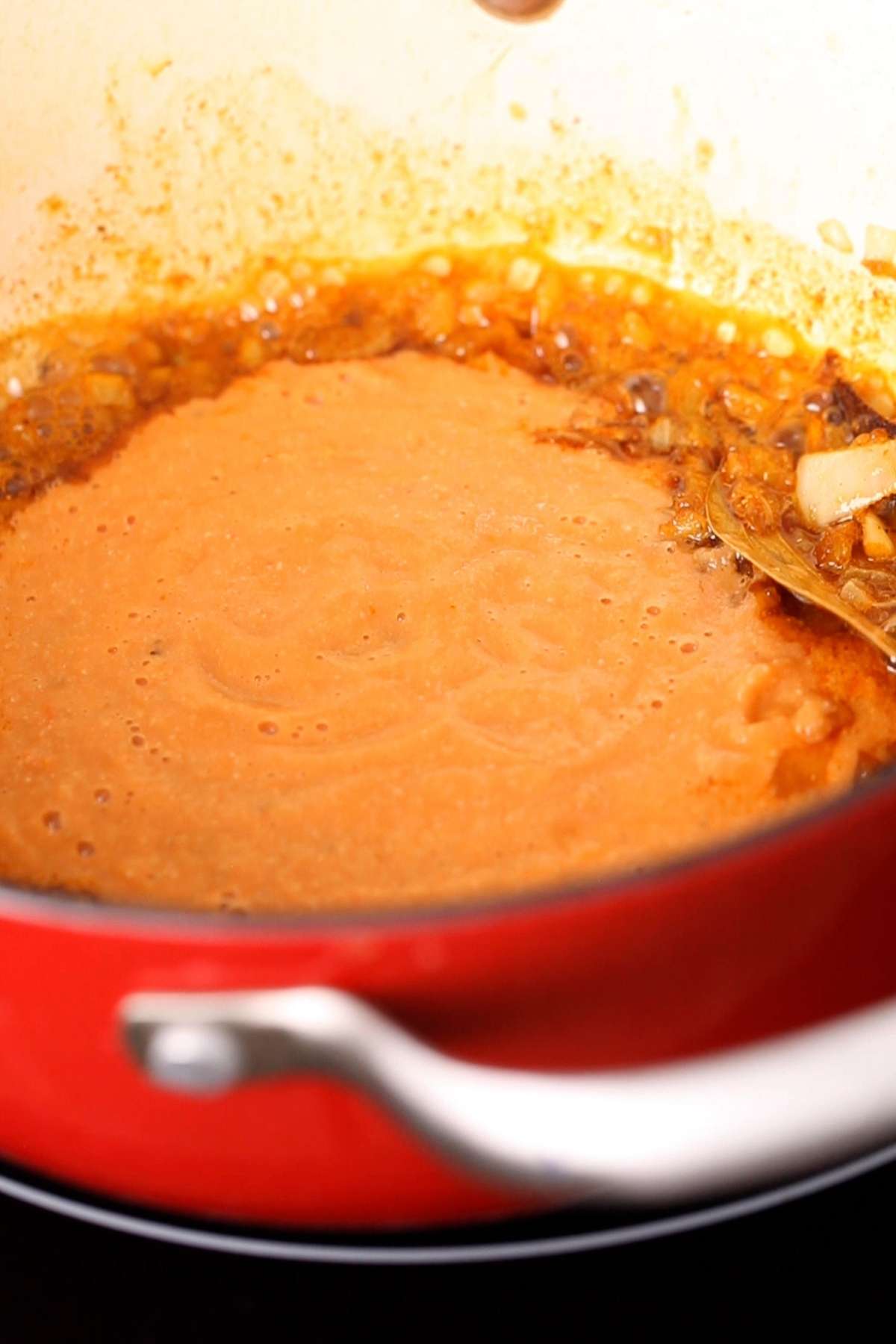 Add blended tomatoes.