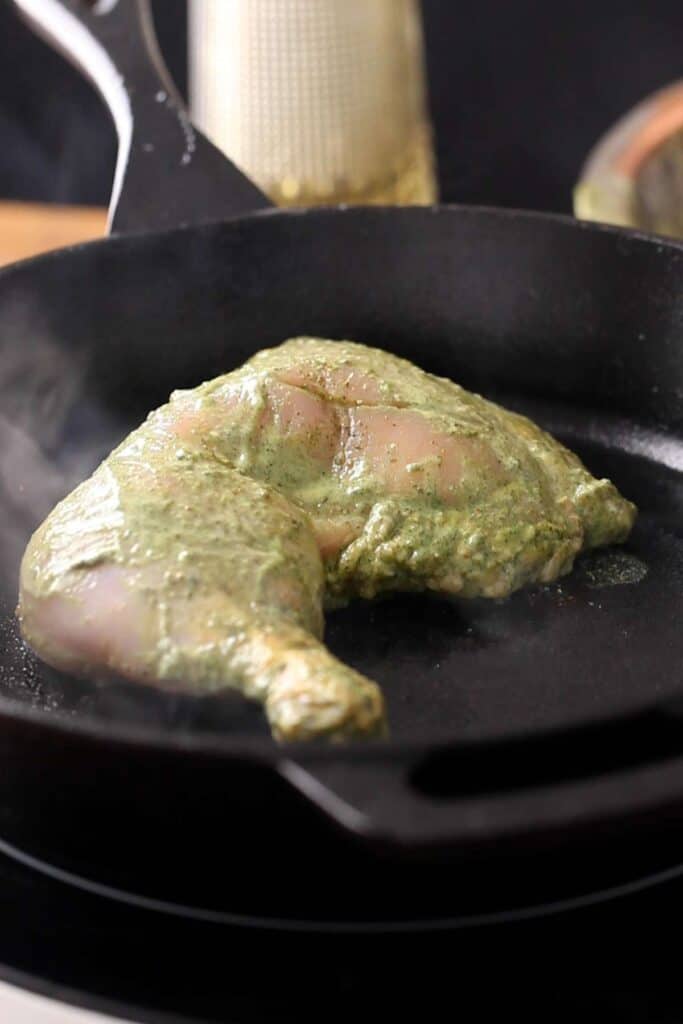 Char the marinated chicken on high heat.