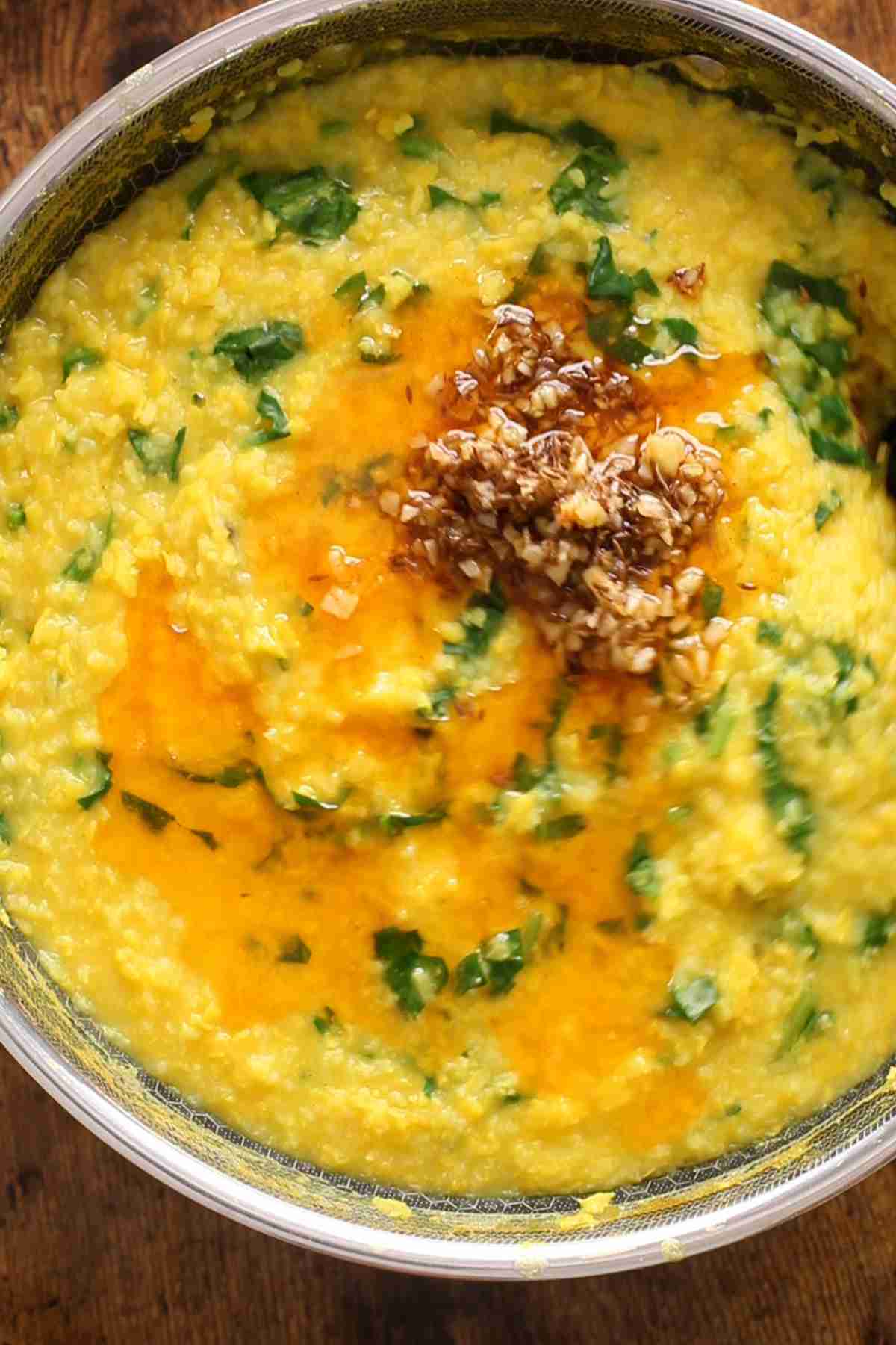 Top the khichdi with tadka.