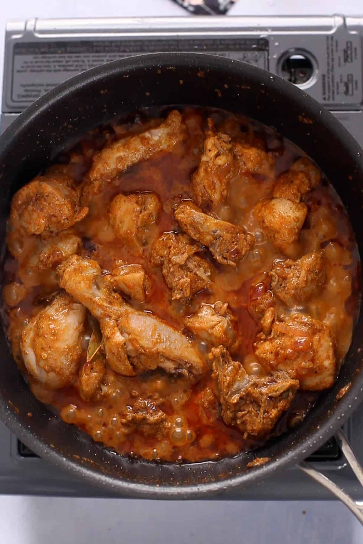 Chicken is fully smoked and there is liquid in the pot.