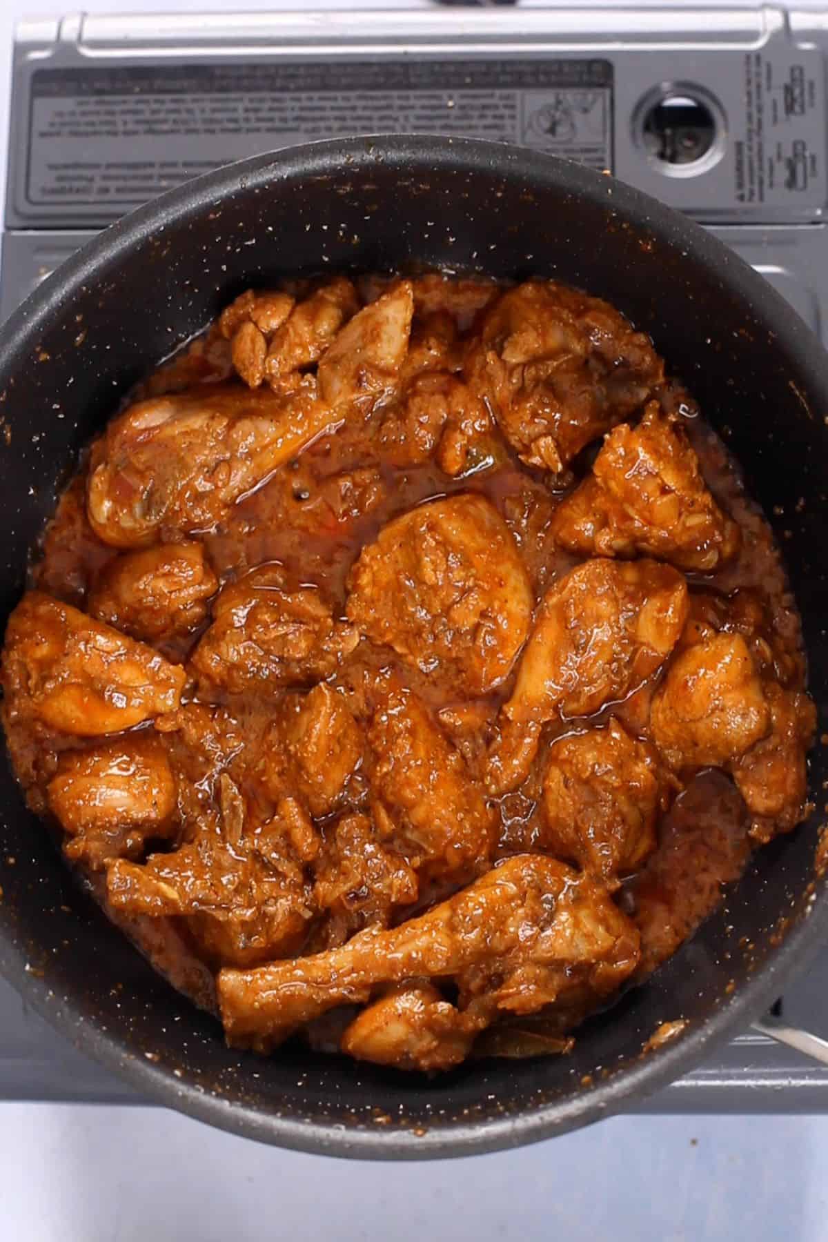 Chicken is stir fried again until the sauce is thick.