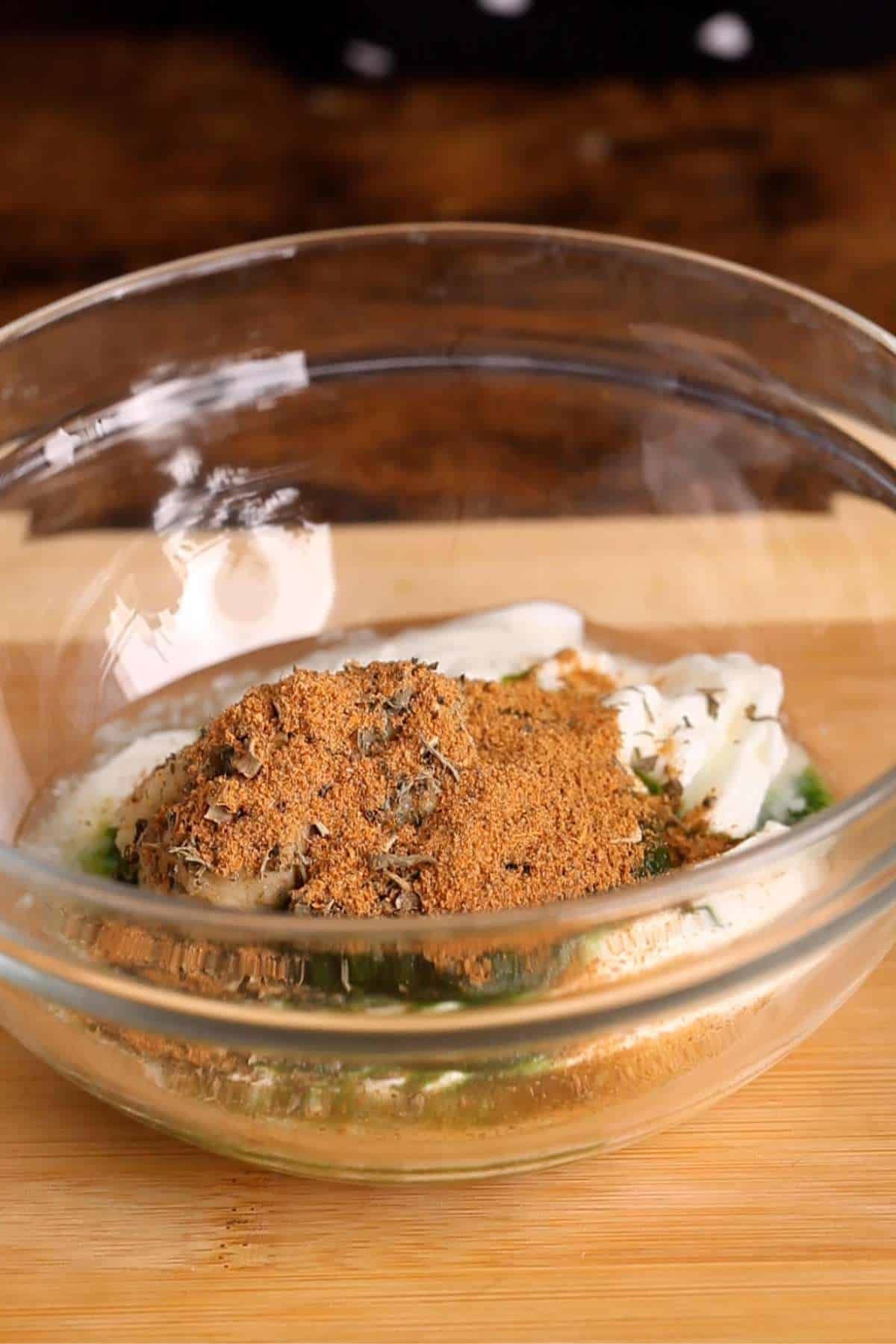 Add all the spices next to the green marinade.