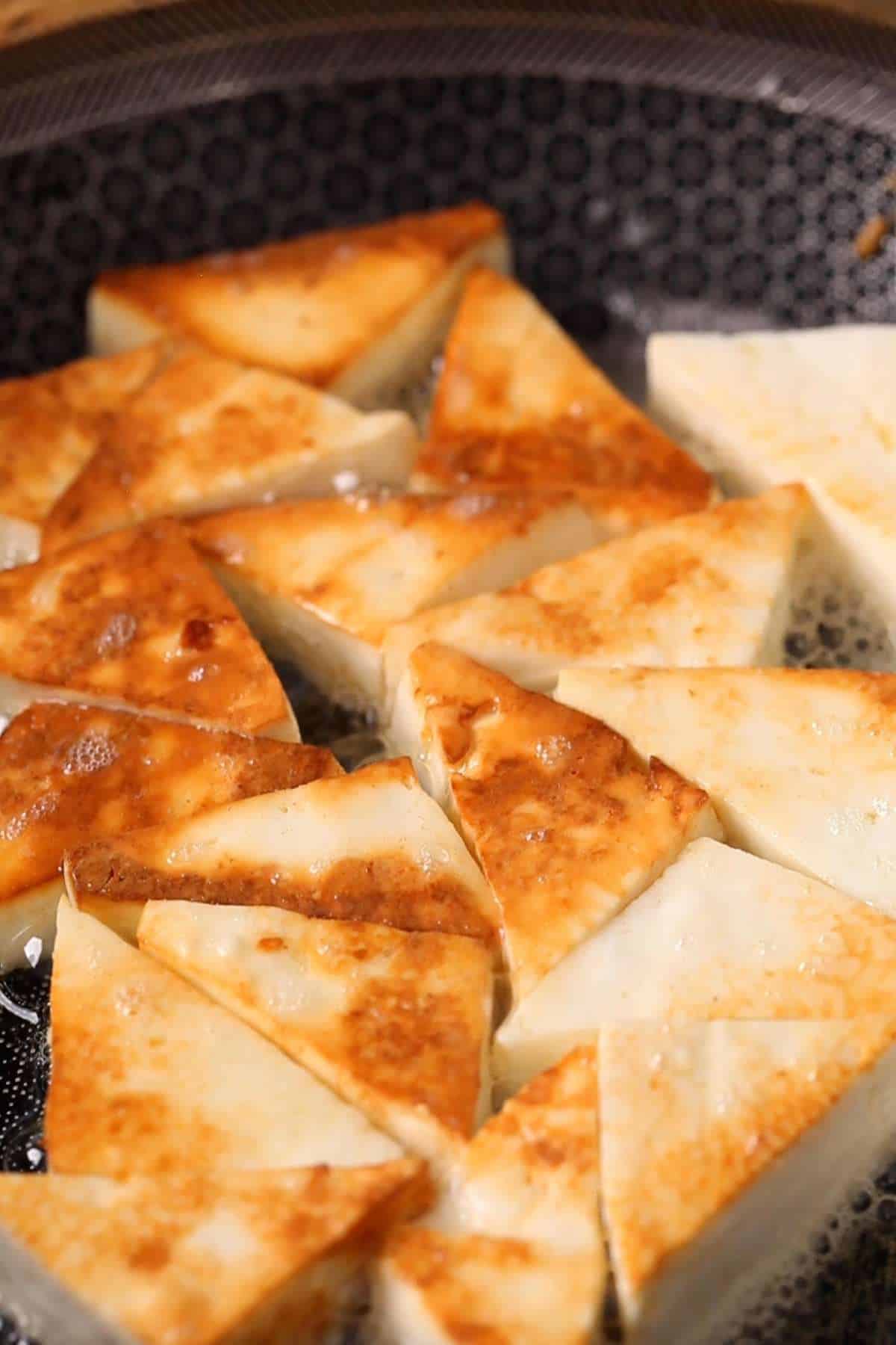 Panfrying paneer in butter.