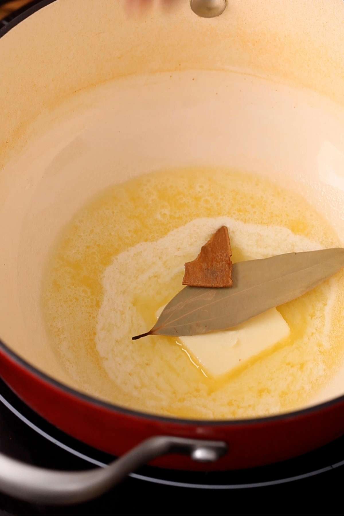 Temper butter with bay leaf and cinnamon.