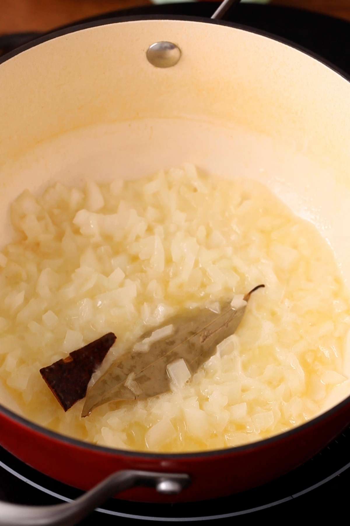 Lightly cook onion till translucent.