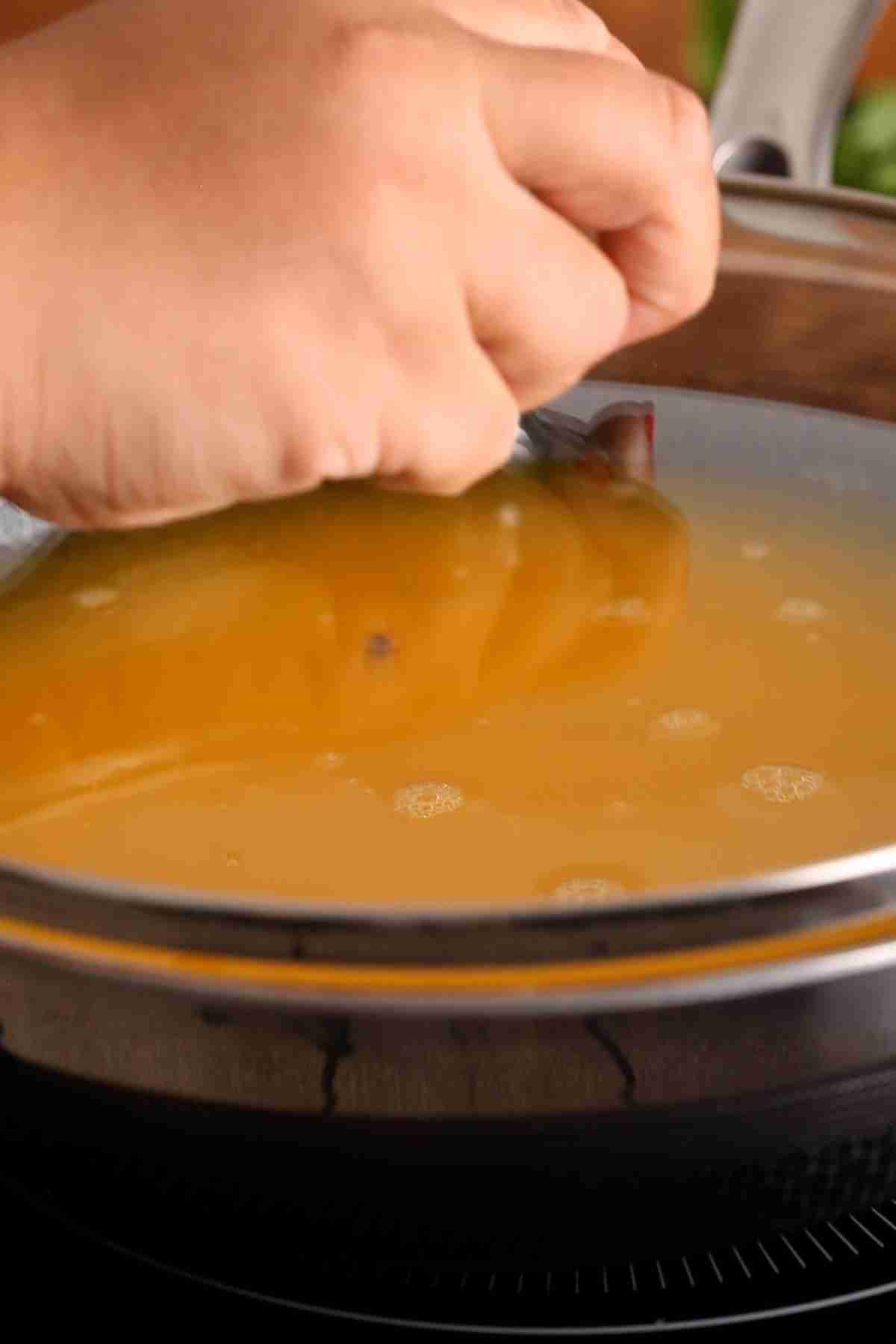 Cover and cook till lentils and rice are soft.