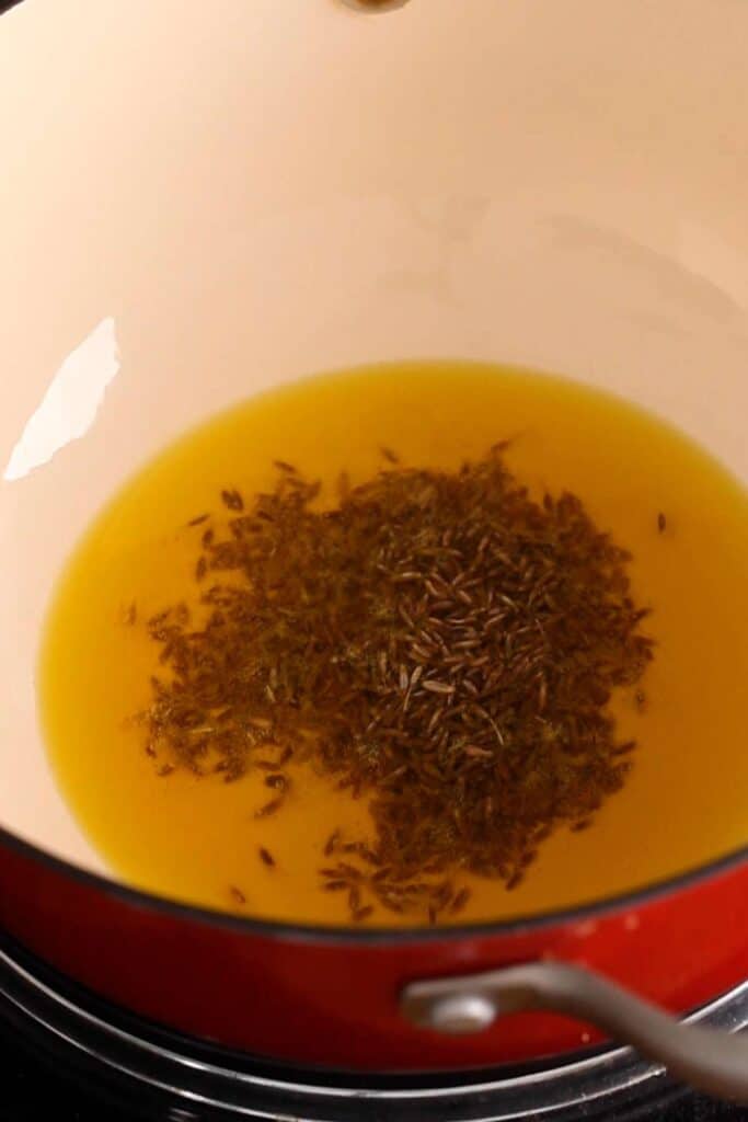 Crackle cumin seeds in mustard oil