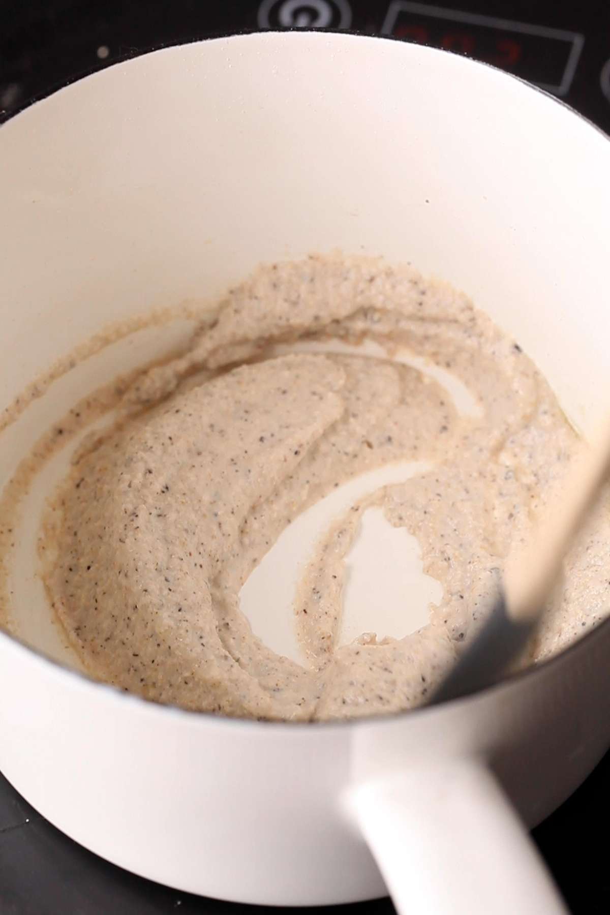Almond paste being sautéed in ghee.