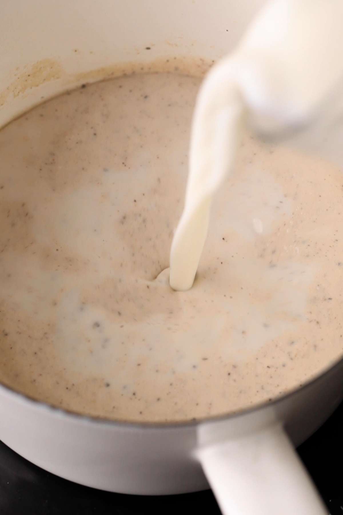 Adding milk to almost paste.