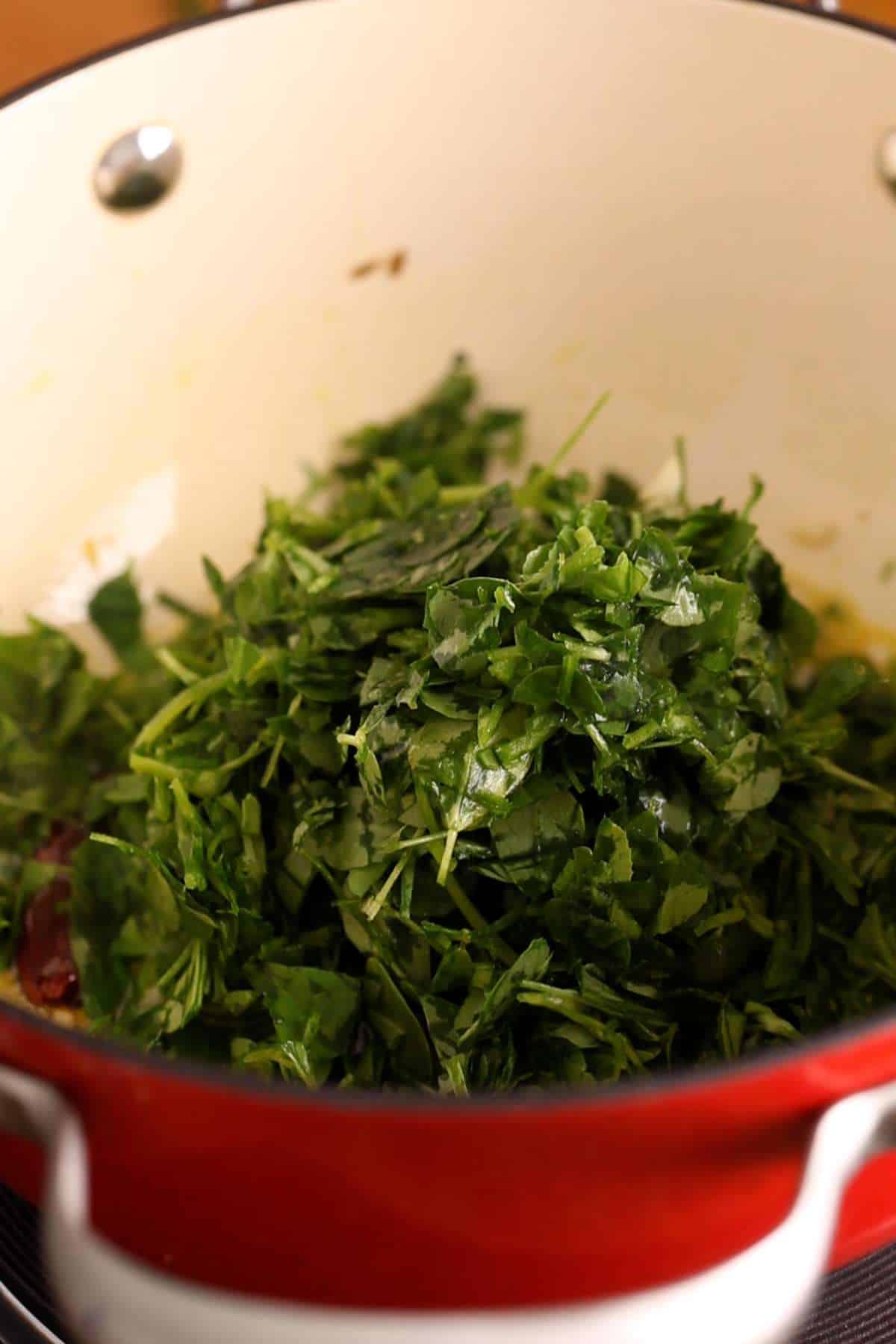 Add chopped fresh methi leaves.