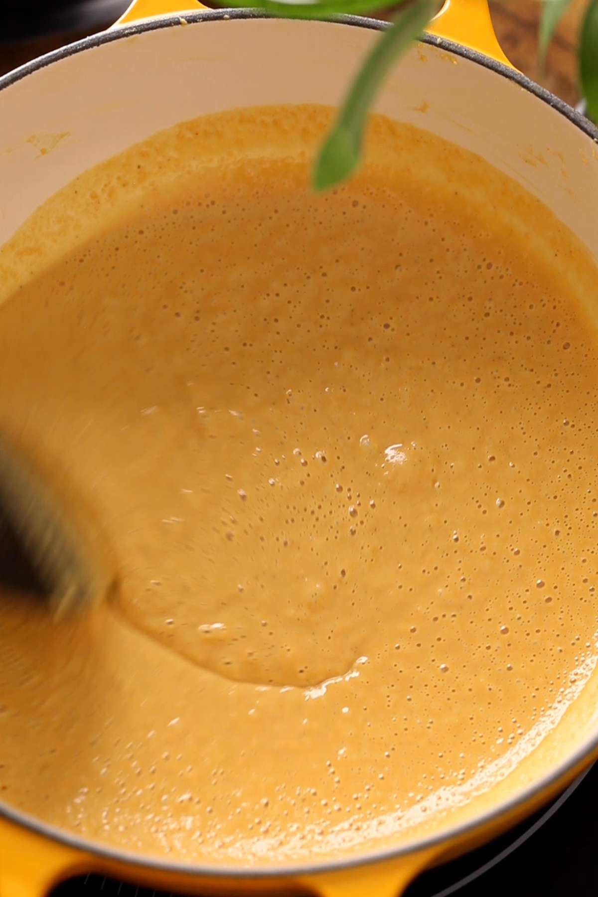 Besan mixture getting light and fluffy as it roasts. 