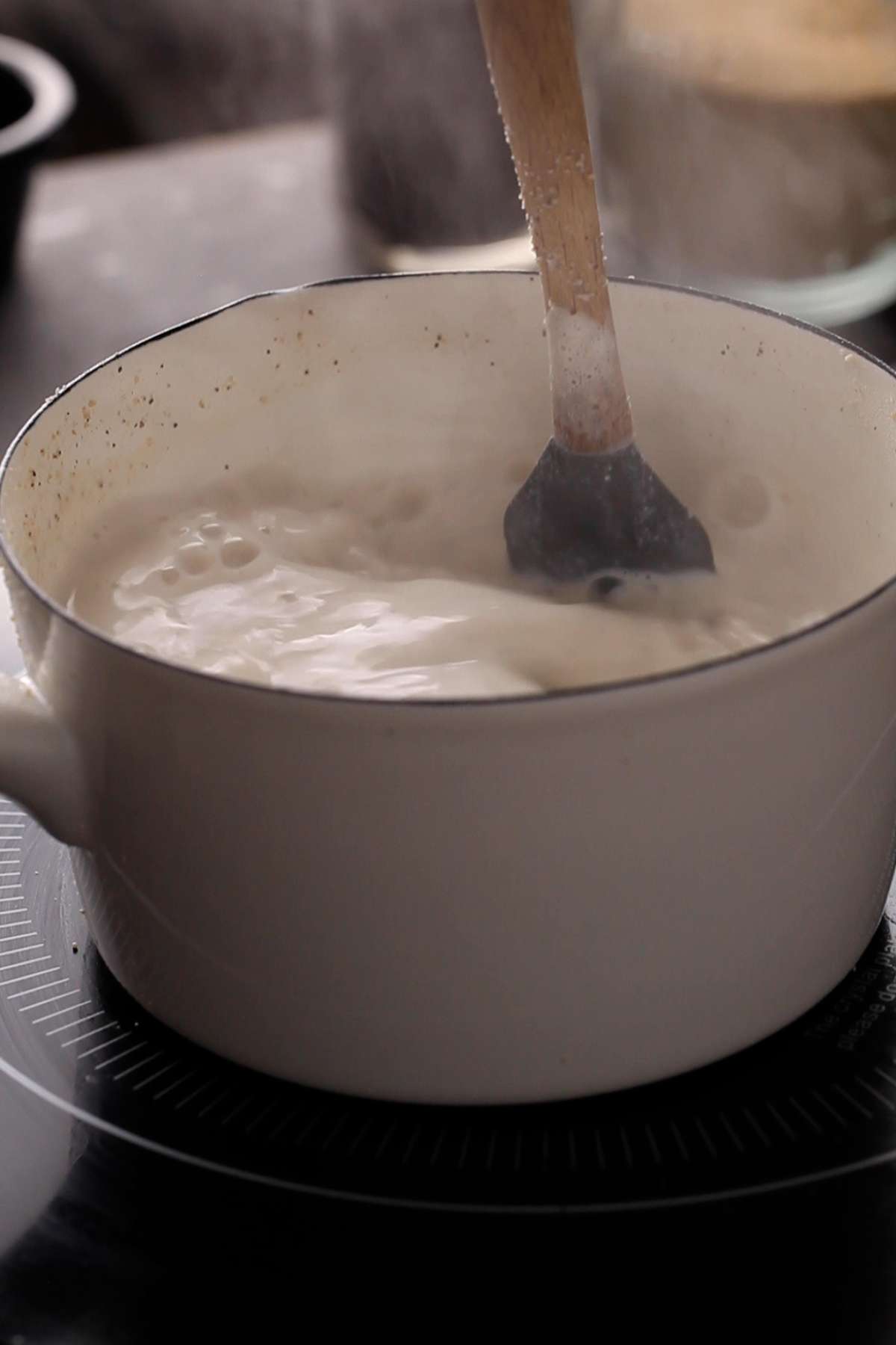 Simmering badam milk over low stove.